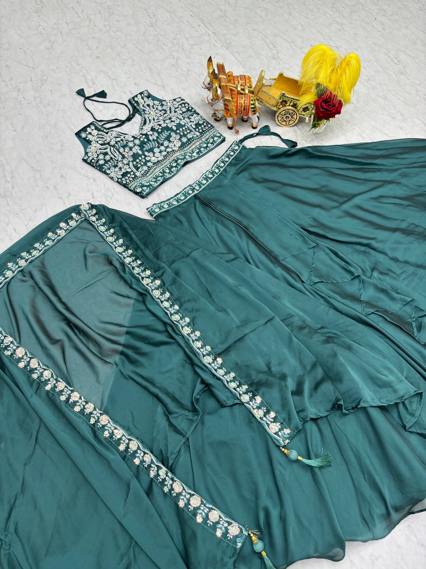 Attractive Teal Blue Embroidered Silk Lehenga Choli With Shrug
