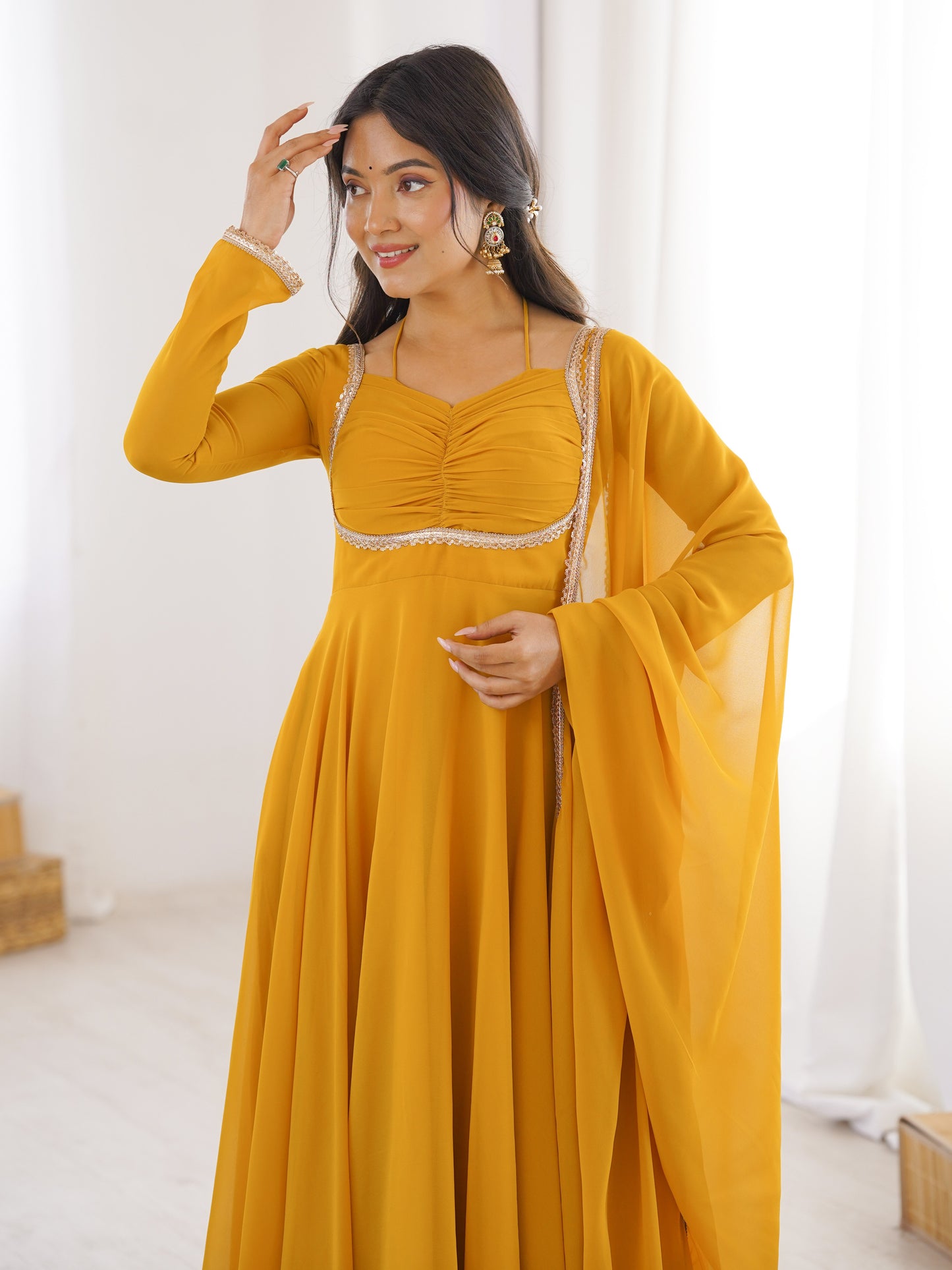 Astonishing Yellow Plain Georgette Haldi Wear Gown