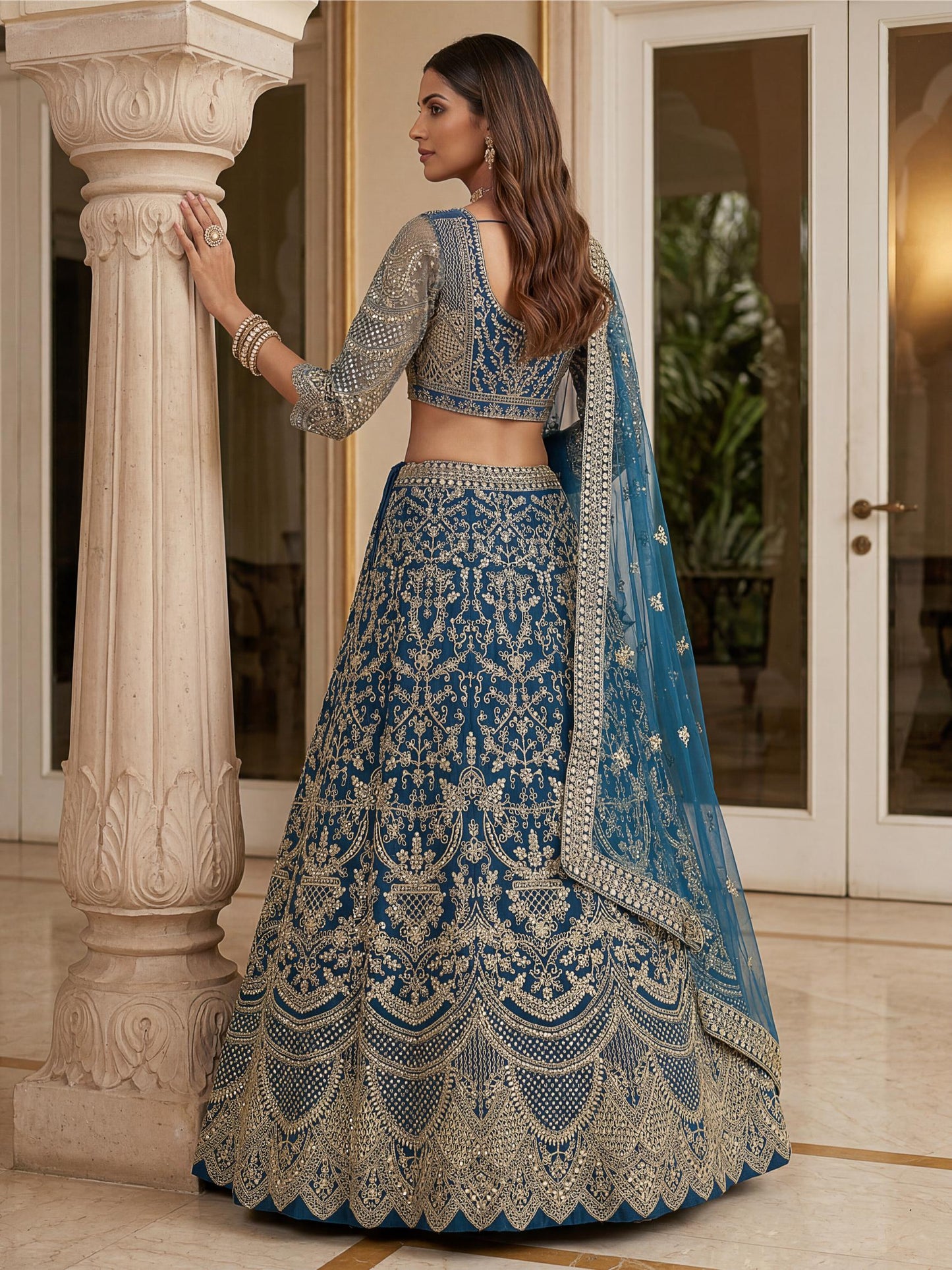 Spectacular Teal Blue Heavy Embroidered Net Reception Lehenga Choli