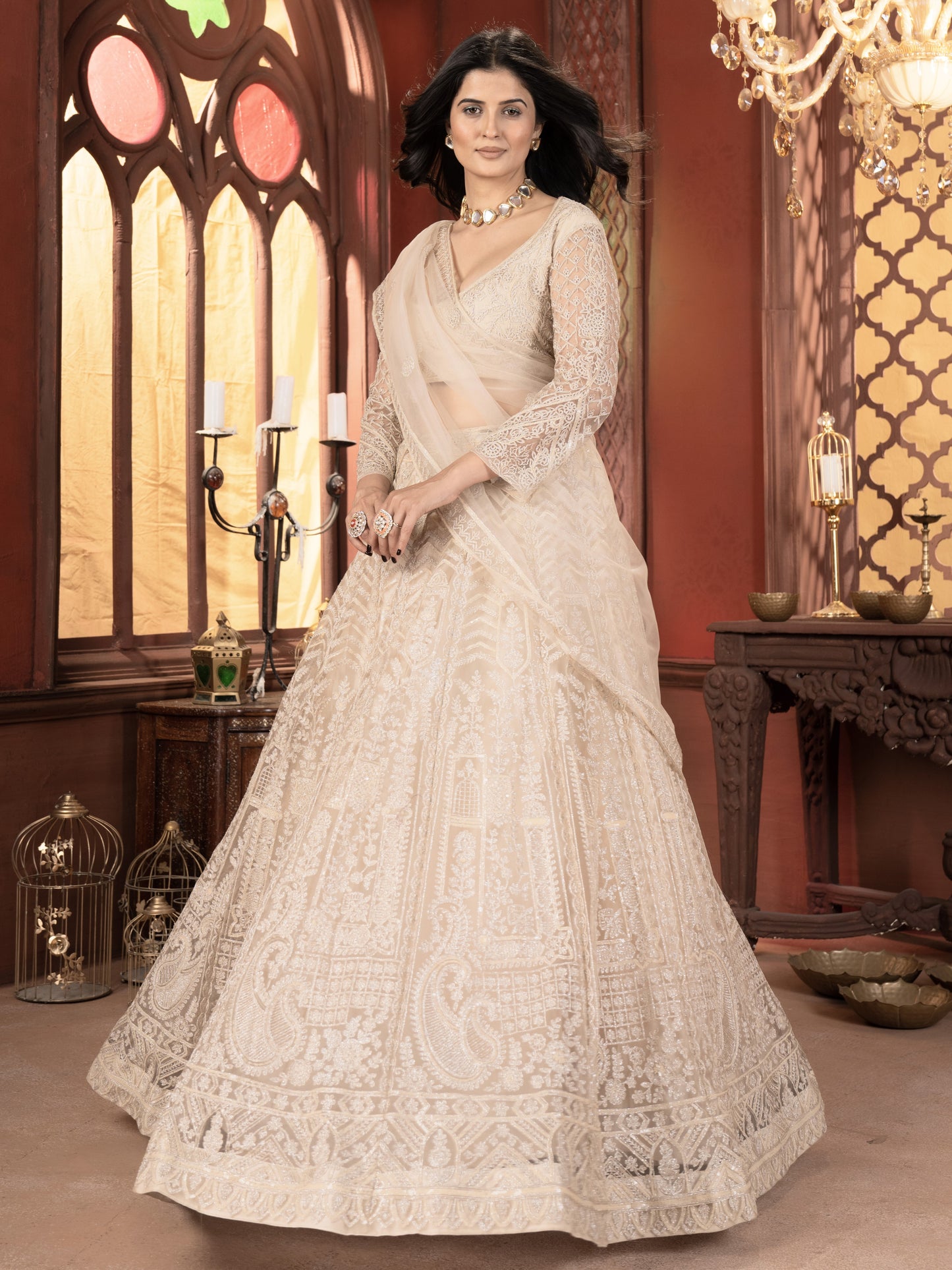 Bewitching Cream Embroidered Net Bridesmaid Lehenga Choli