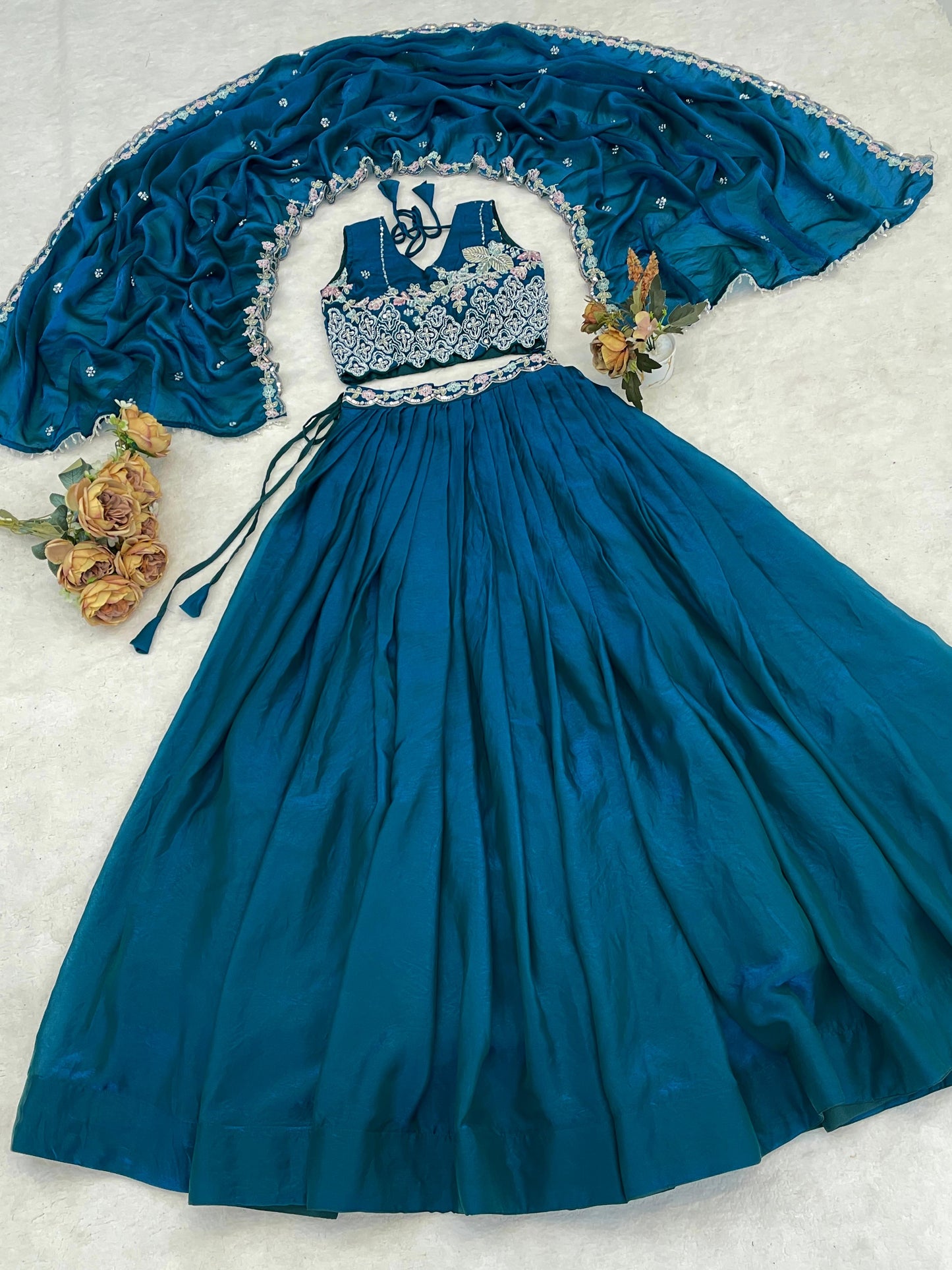 Attractive Blue Embroidered Silk Wedding Lehenga Choli