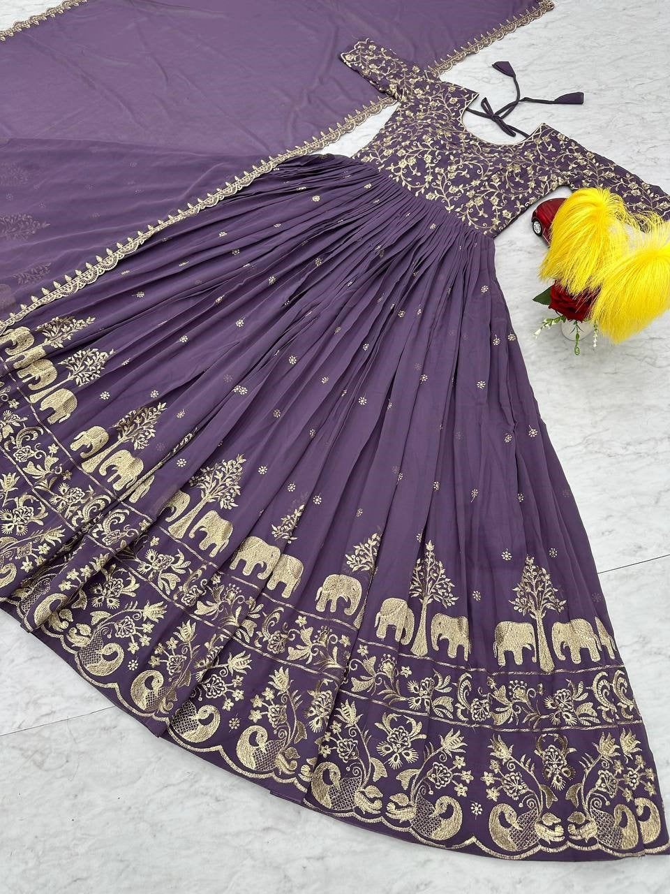 Charming Purple Embroidered Georgette Wedding Wear Gown