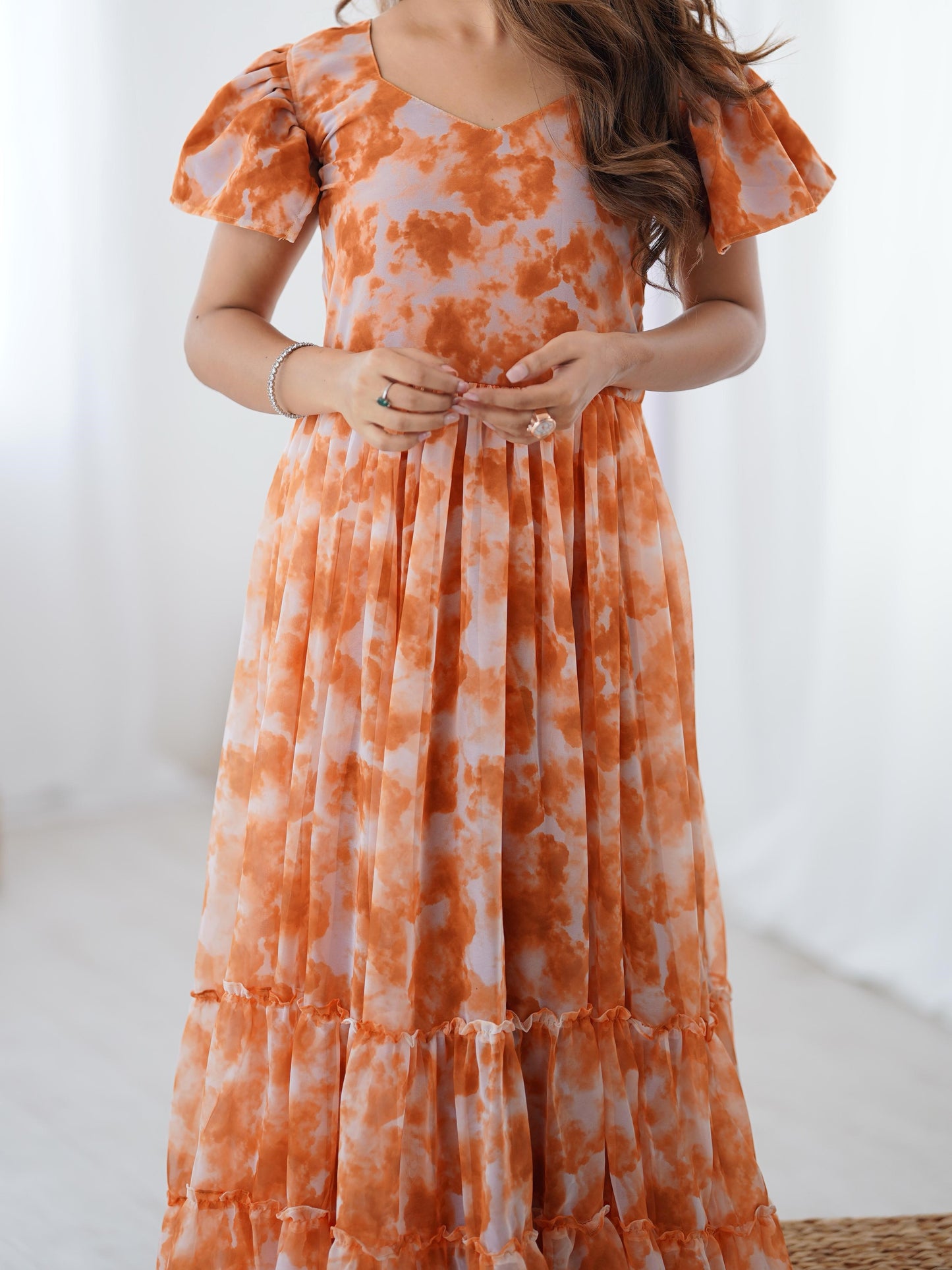 Beautiful Orange Printed Georgette Casual Wear Gown