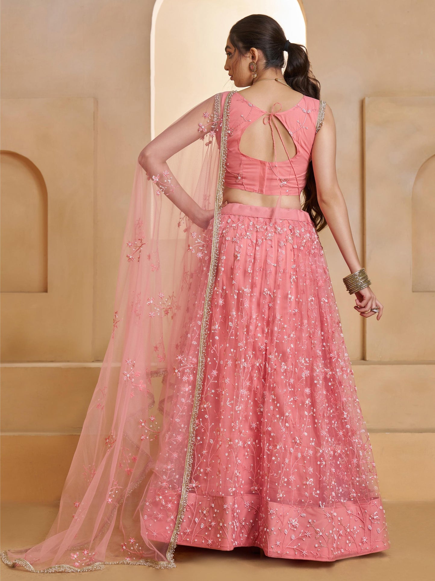 Astonishing Pink Embroidered Net Bridesmaid Lehenga Choli