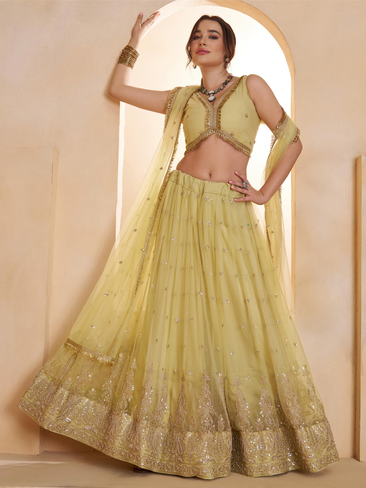 Alluring Green Embroidered Net Mehndi Wear Lehenga Choli