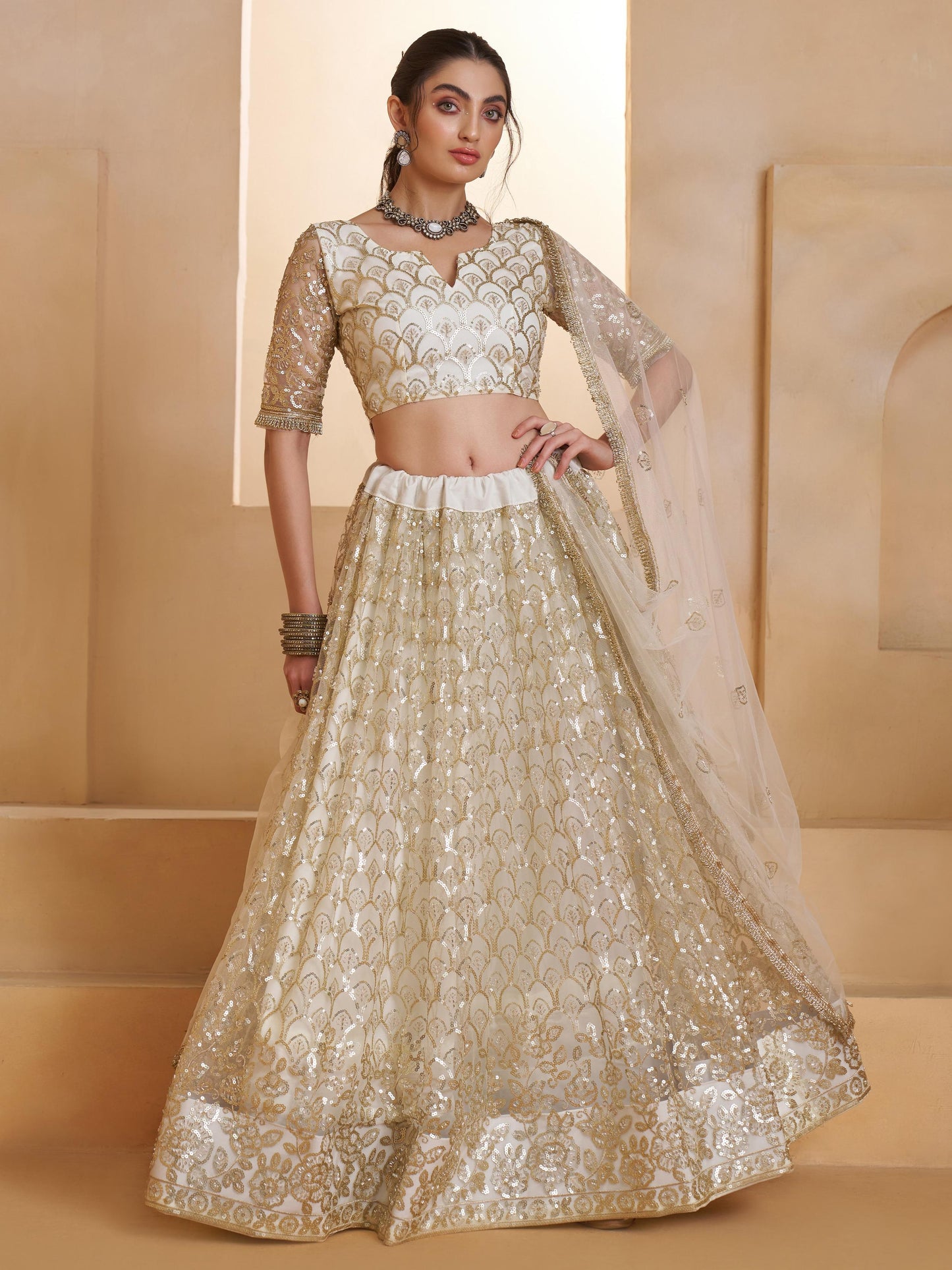 Spectacular Off-White Sequins Work Net Designer Lehenga Choli