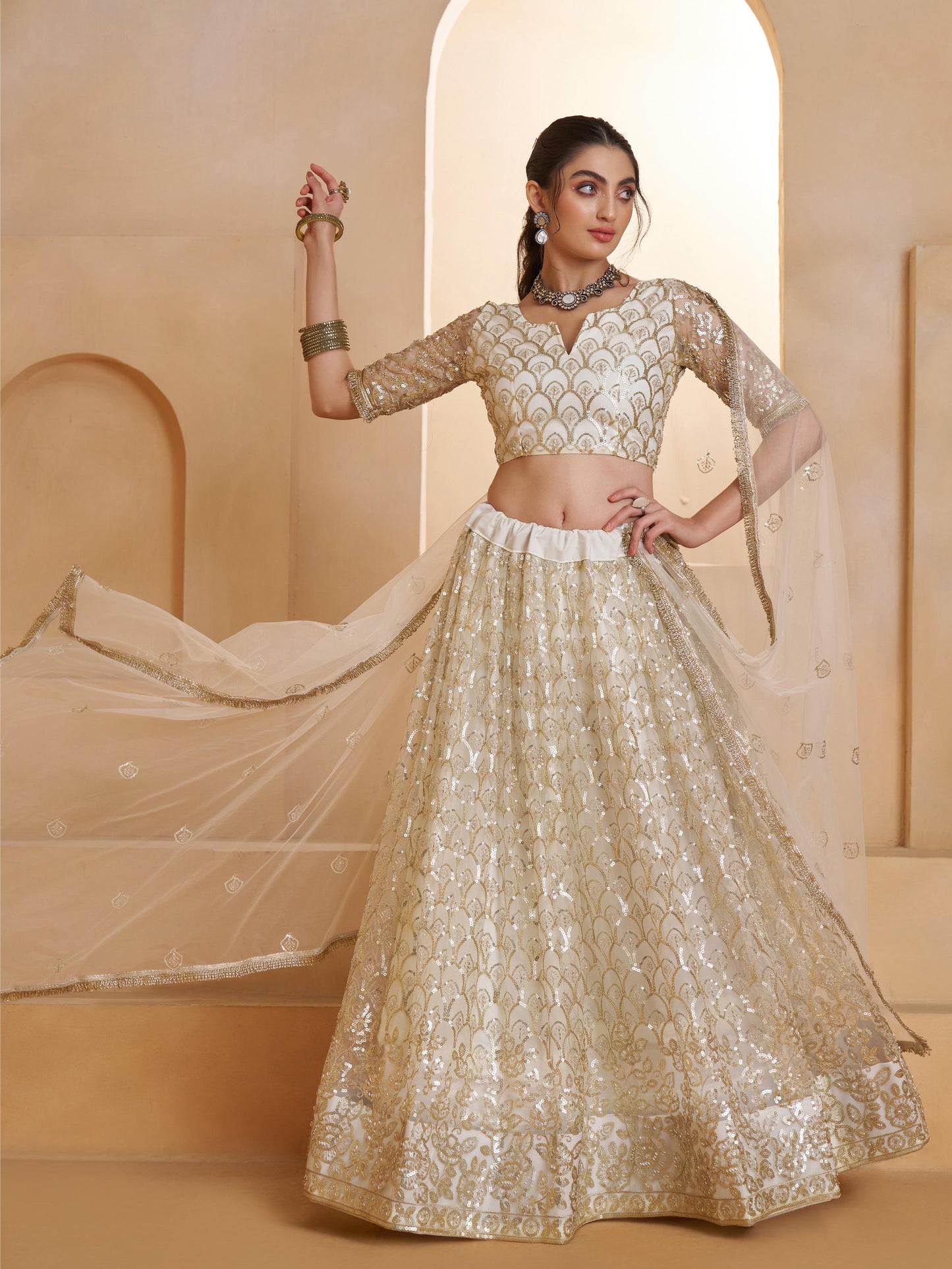 Spectacular Off-White Sequins Work Net Designer Lehenga Choli