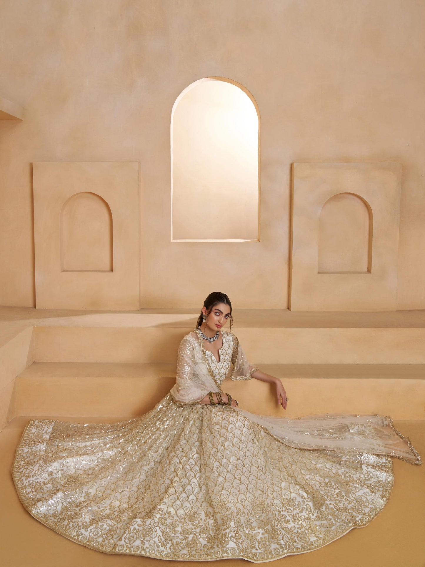 Spectacular Off-White Sequins Work Net Designer Lehenga Choli