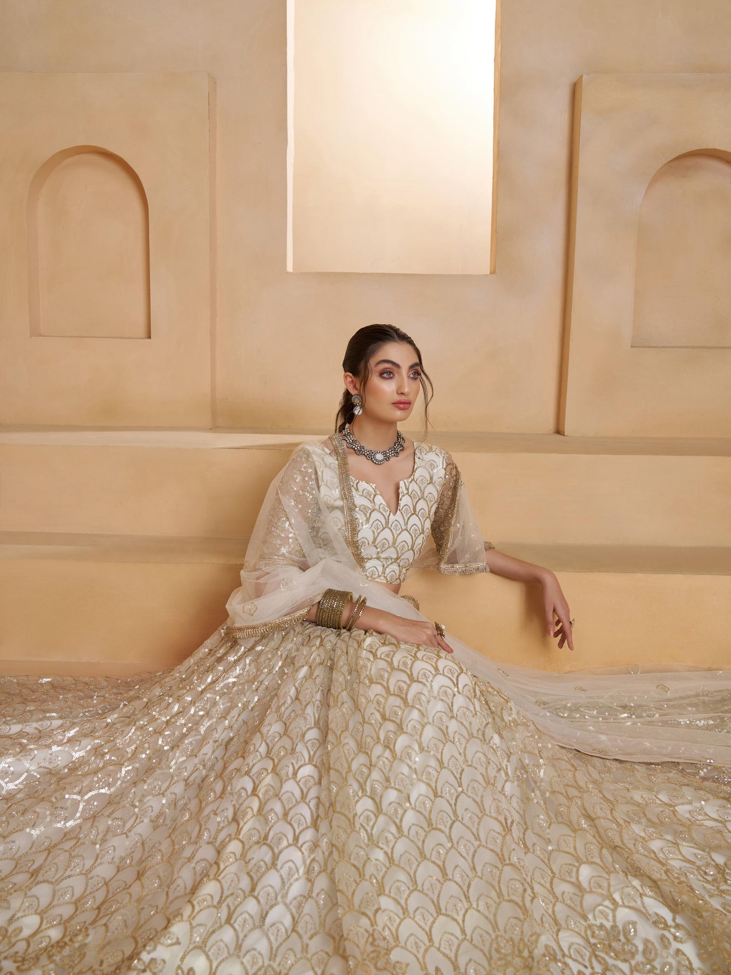 Spectacular Off-White Sequins Work Net Designer Lehenga Choli