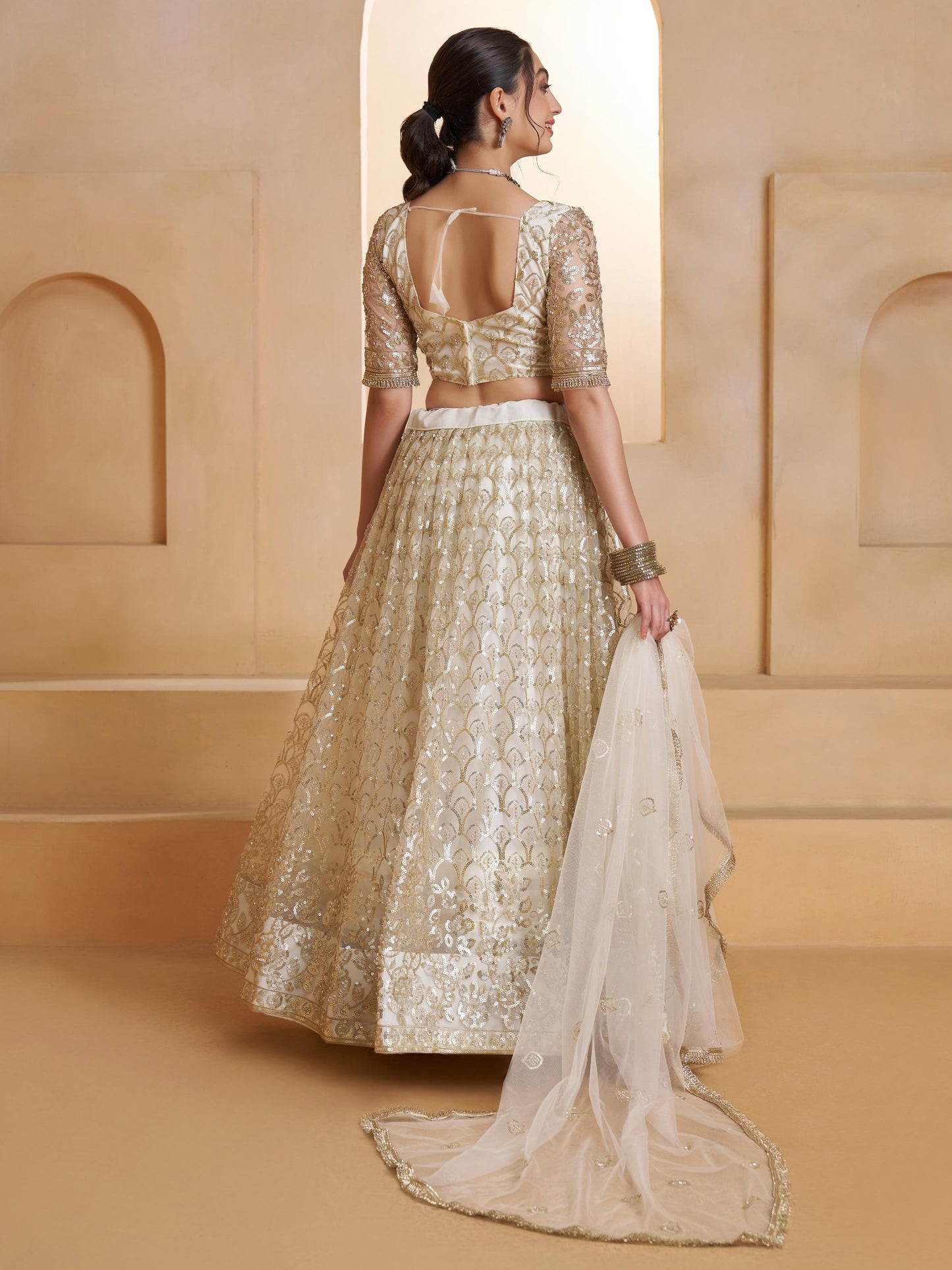 Spectacular Off-White Sequins Work Net Designer Lehenga Choli
