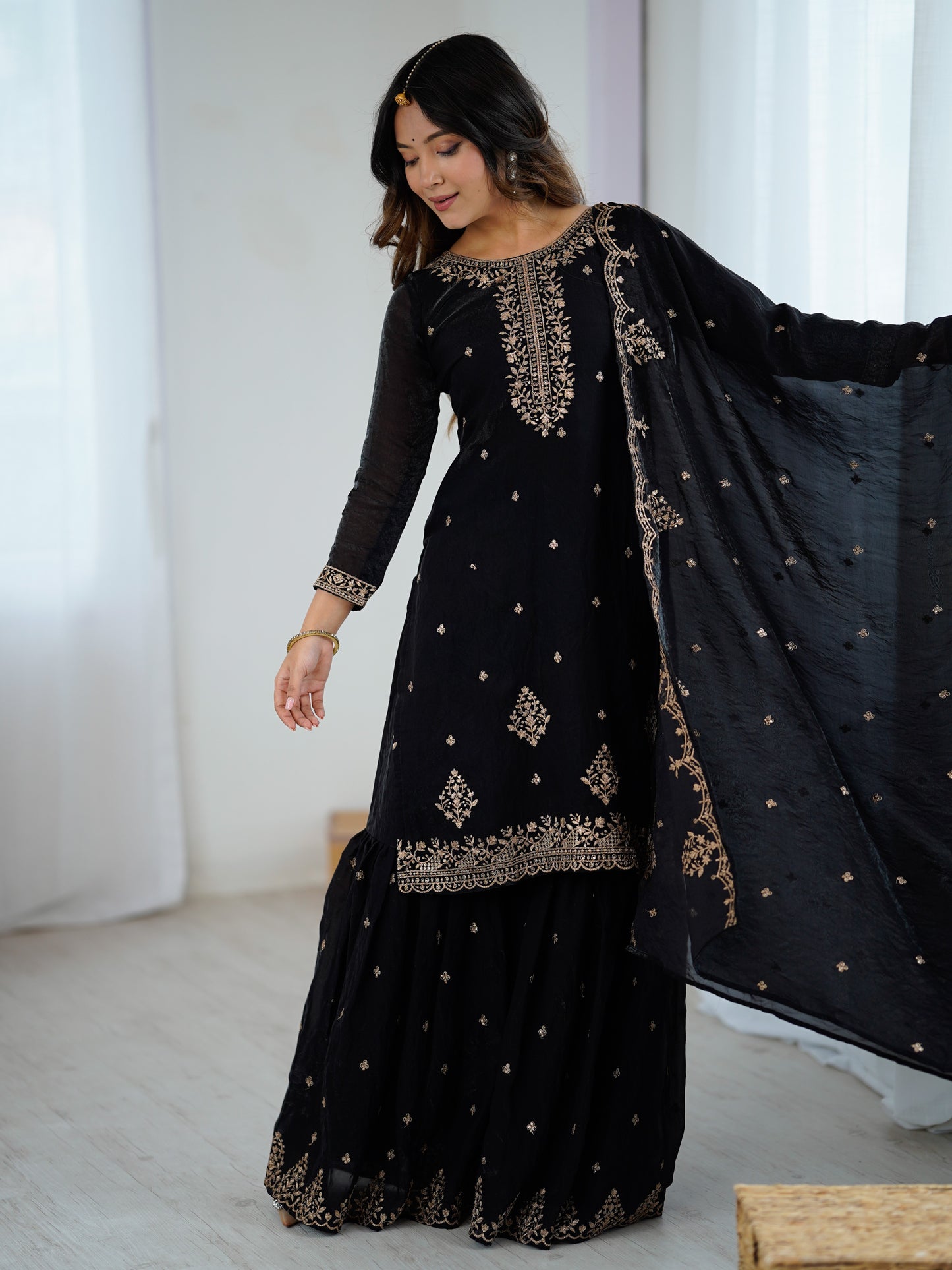 Wonderful Black Zari Embroidered Silk Reception Sharara Suit