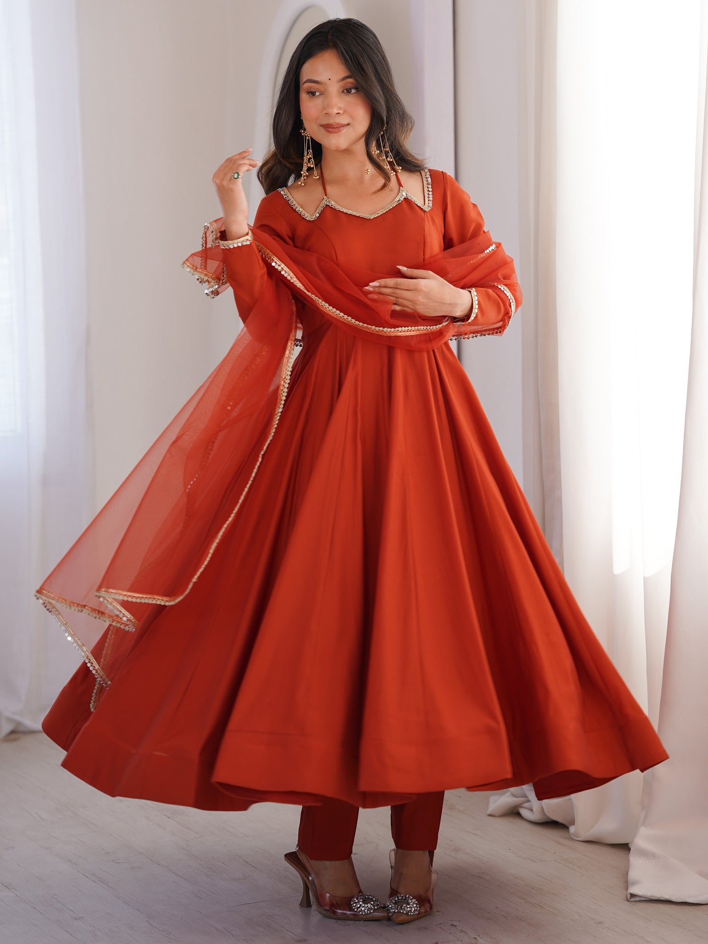 Wonderful Rust Orange Plain Roman Silk Anarkali Suit