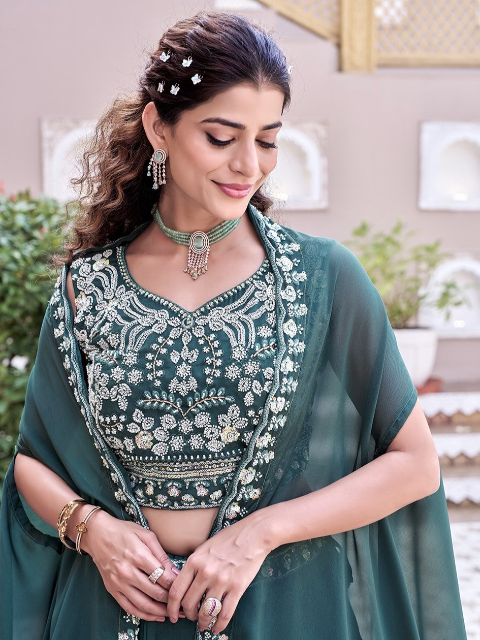 Attractive Teal Blue Embroidered Silk Lehenga Choli With Shrug