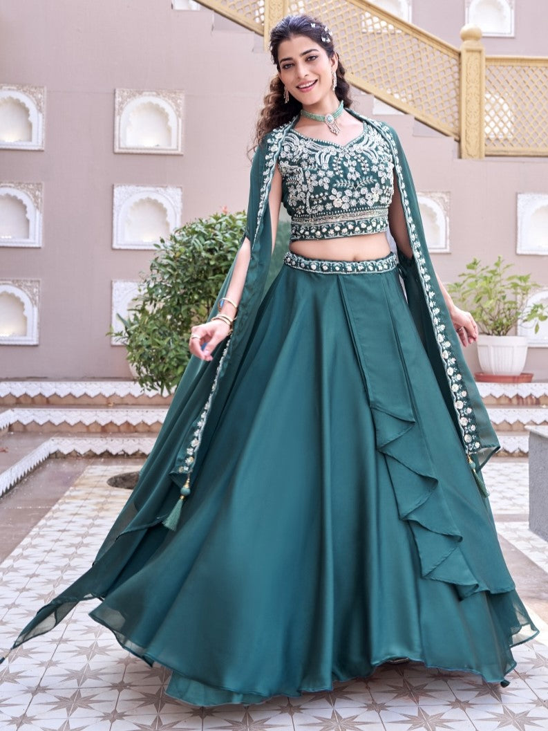Attractive Teal Blue Embroidered Silk Lehenga Choli With Shrug