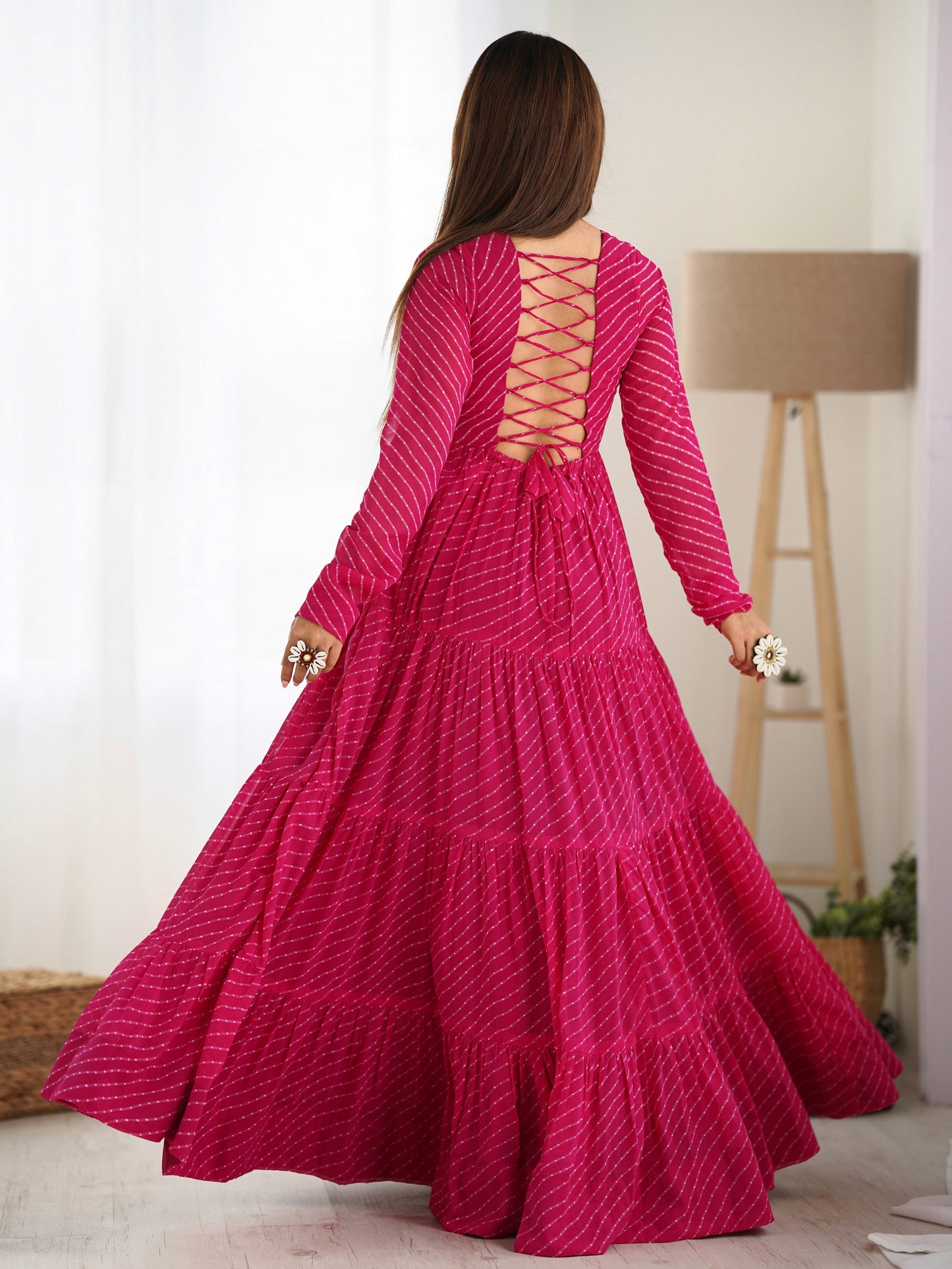 Spectacular Pink Leheriya Printed Georgette Sangeet Wear Gown