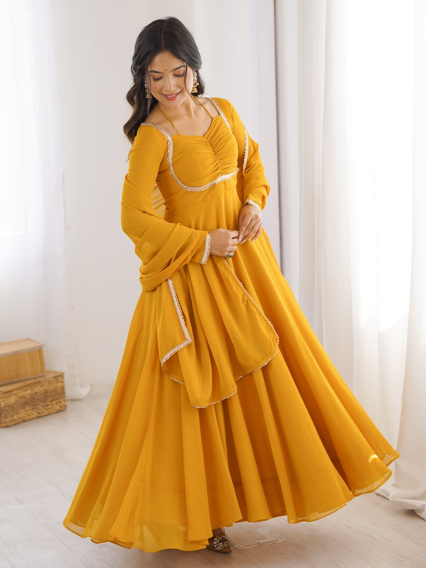 Astonishing Yellow Plain Georgette Haldi Wear Gown