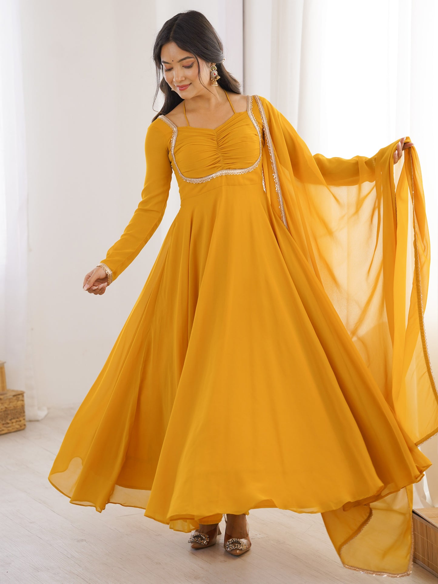 Astonishing Yellow Plain Georgette Haldi Wear Gown