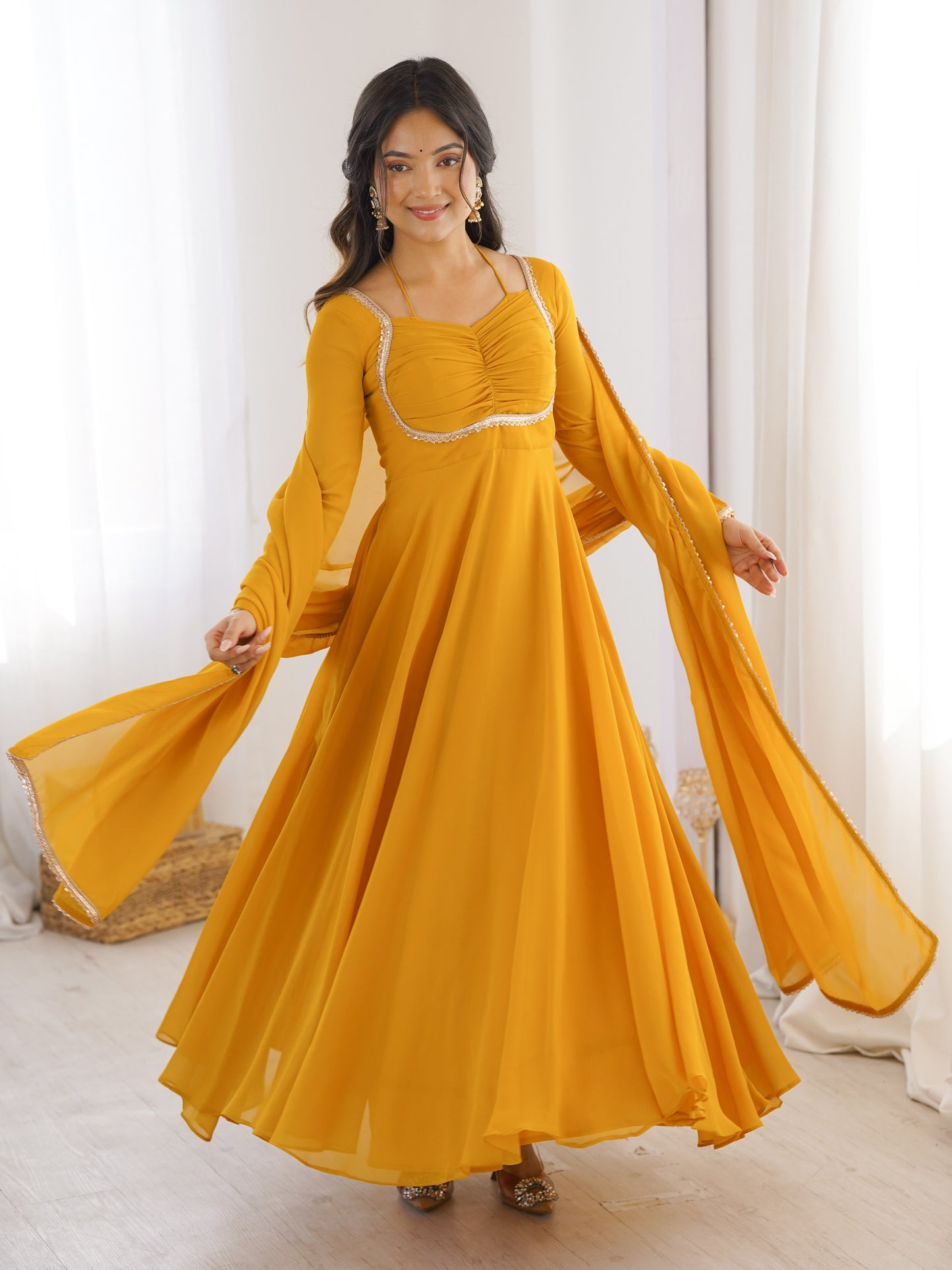 Astonishing Yellow Plain Georgette Haldi Wear Gown