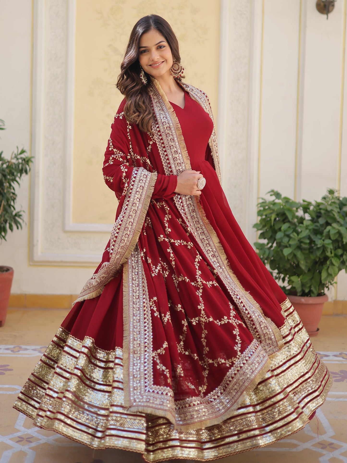 Spectacular Maroon Zari Work Georgette Designer Gown