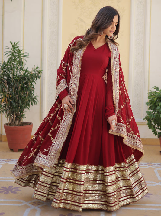 Spectacular Maroon Zari Work Georgette Designer Gown