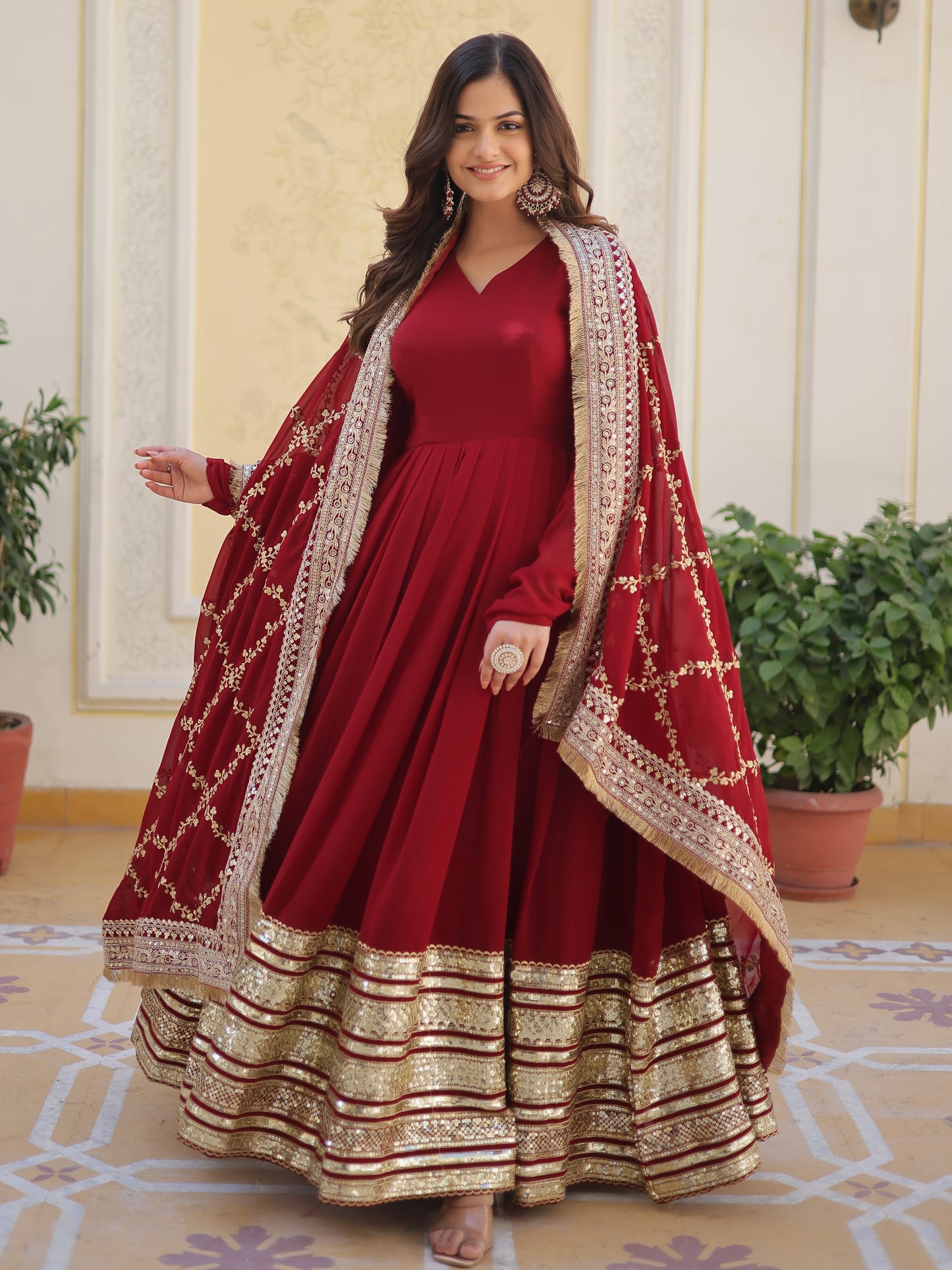 Spectacular Maroon Zari Work Georgette Designer Gown
