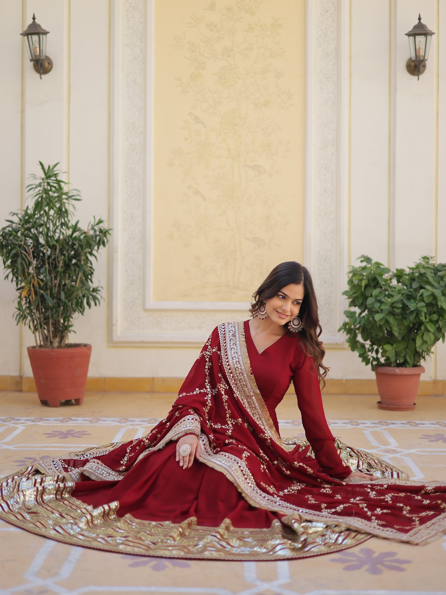 Spectacular Maroon Zari Work Georgette Designer Gown