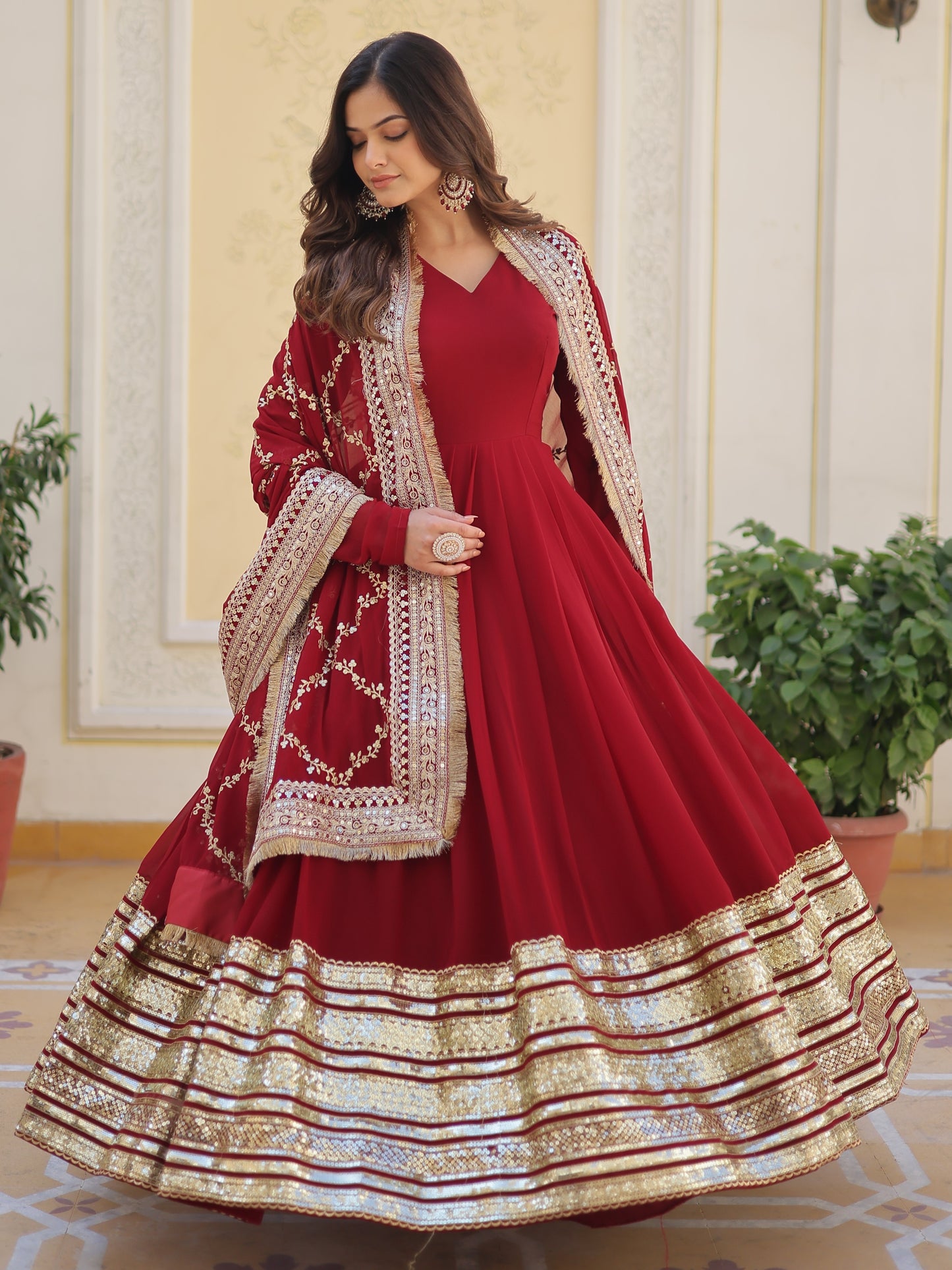 Spectacular Maroon Zari Work Georgette Designer Gown