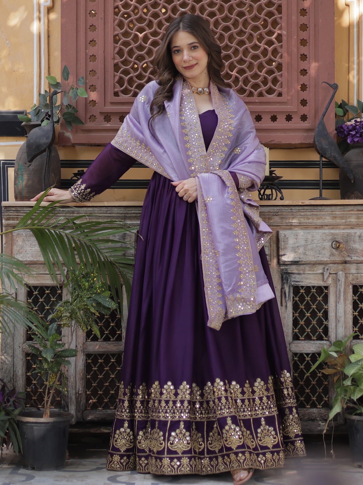 Charming Purple Zari Work Georgette Reception Wear Gown