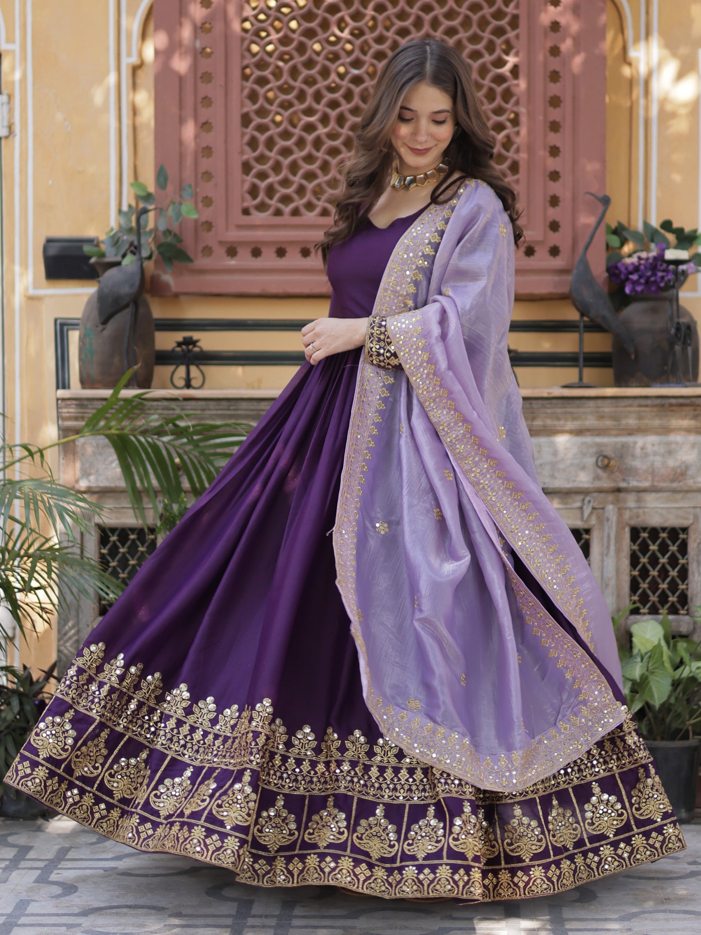 Charming Purple Zari Work Georgette Reception Wear Gown