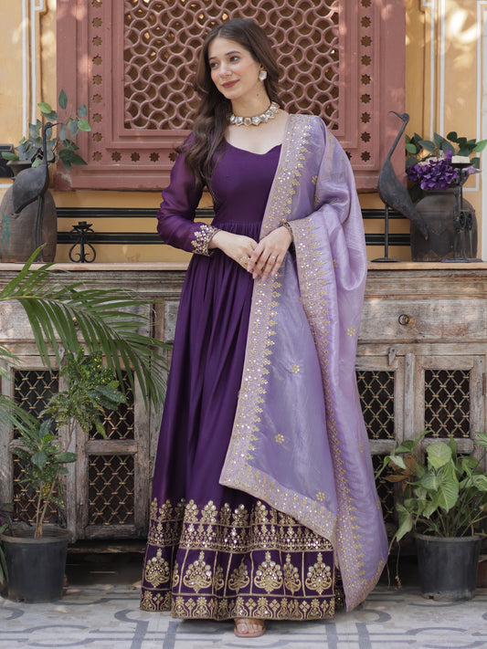 Charming Purple Zari Work Georgette Reception Wear Gown