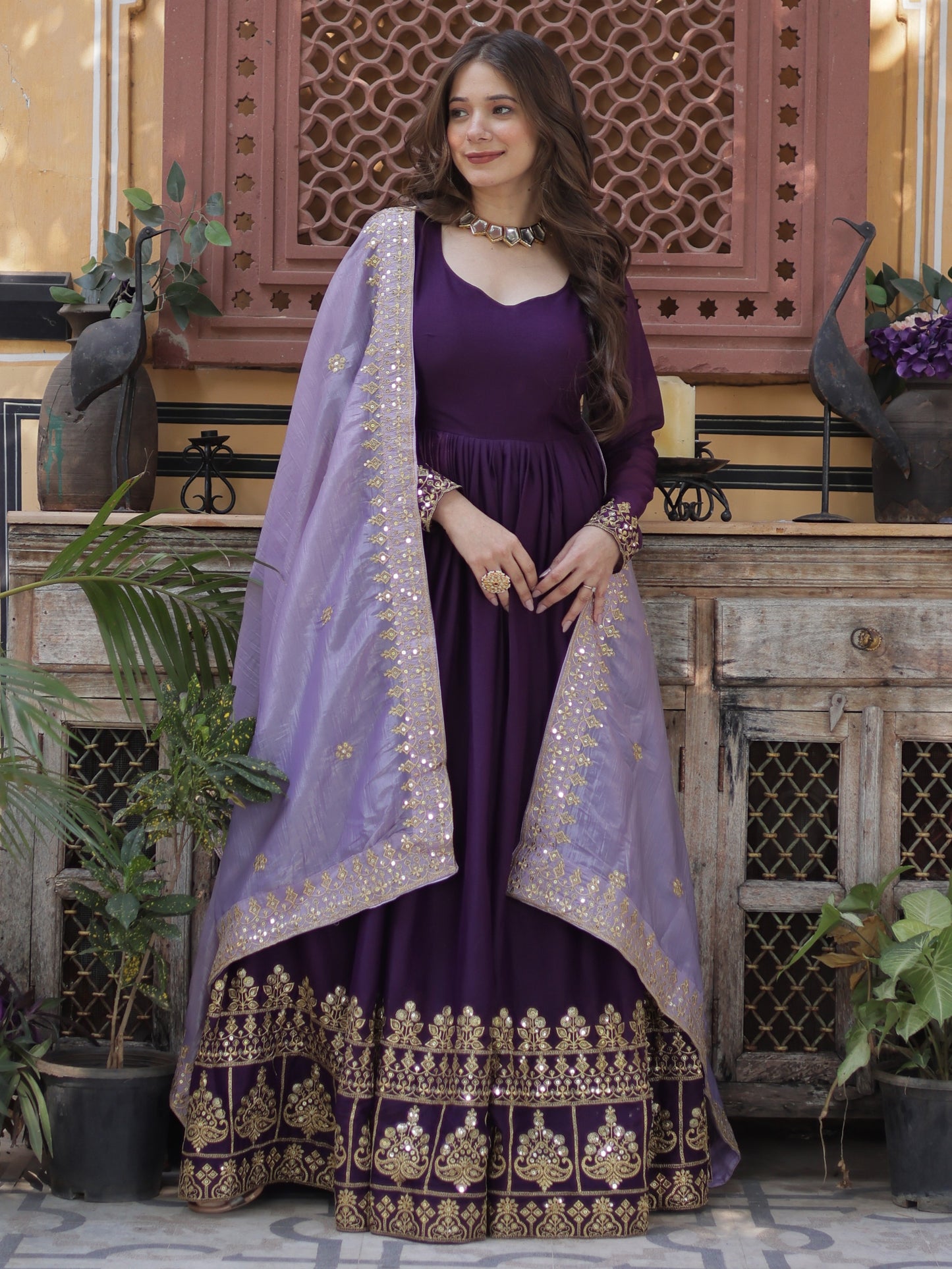 Charming Purple Zari Work Georgette Reception Wear Gown