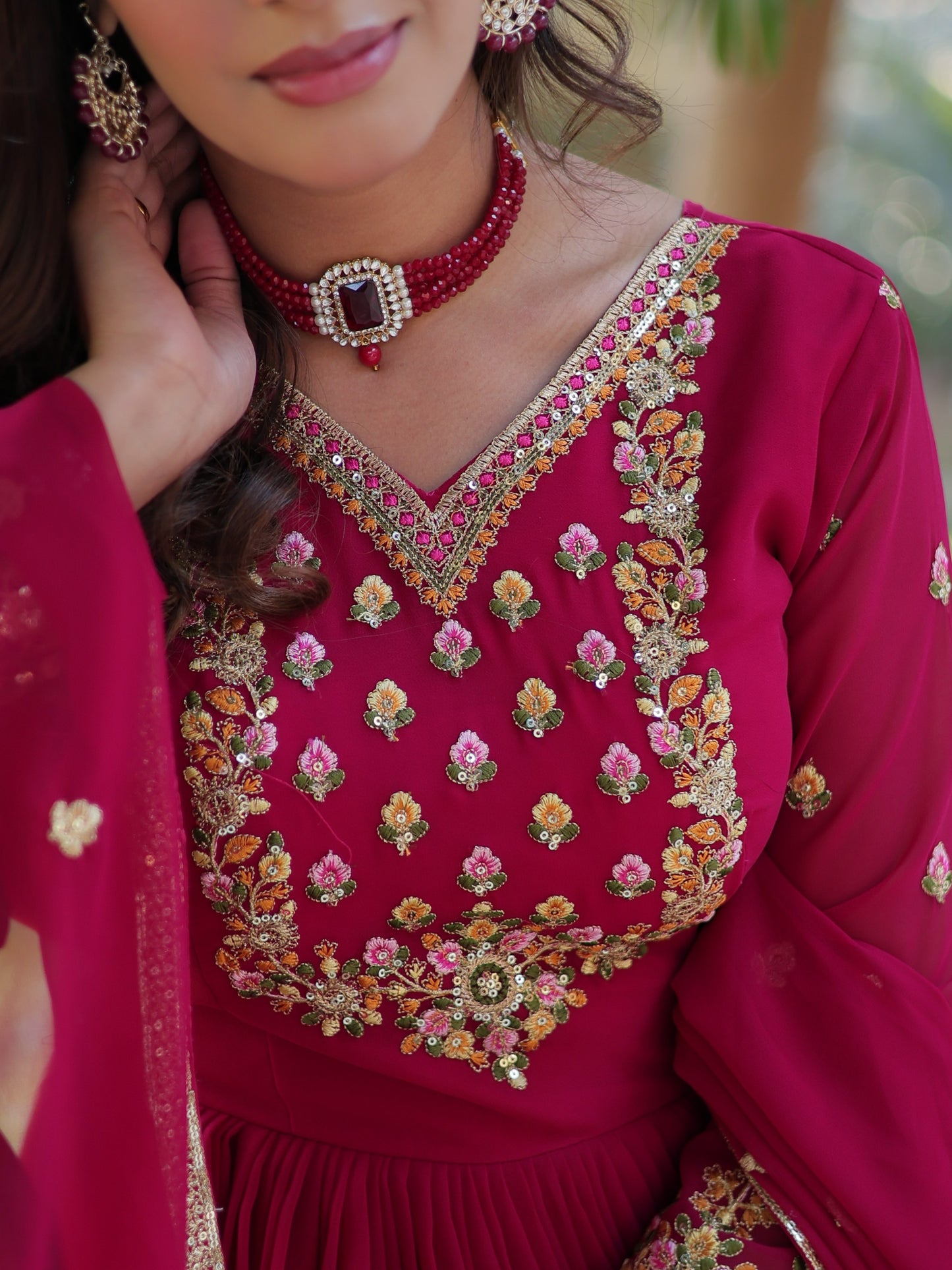 Ravishing Dark Pink Zari Work Georgette Engagement Wear Gown