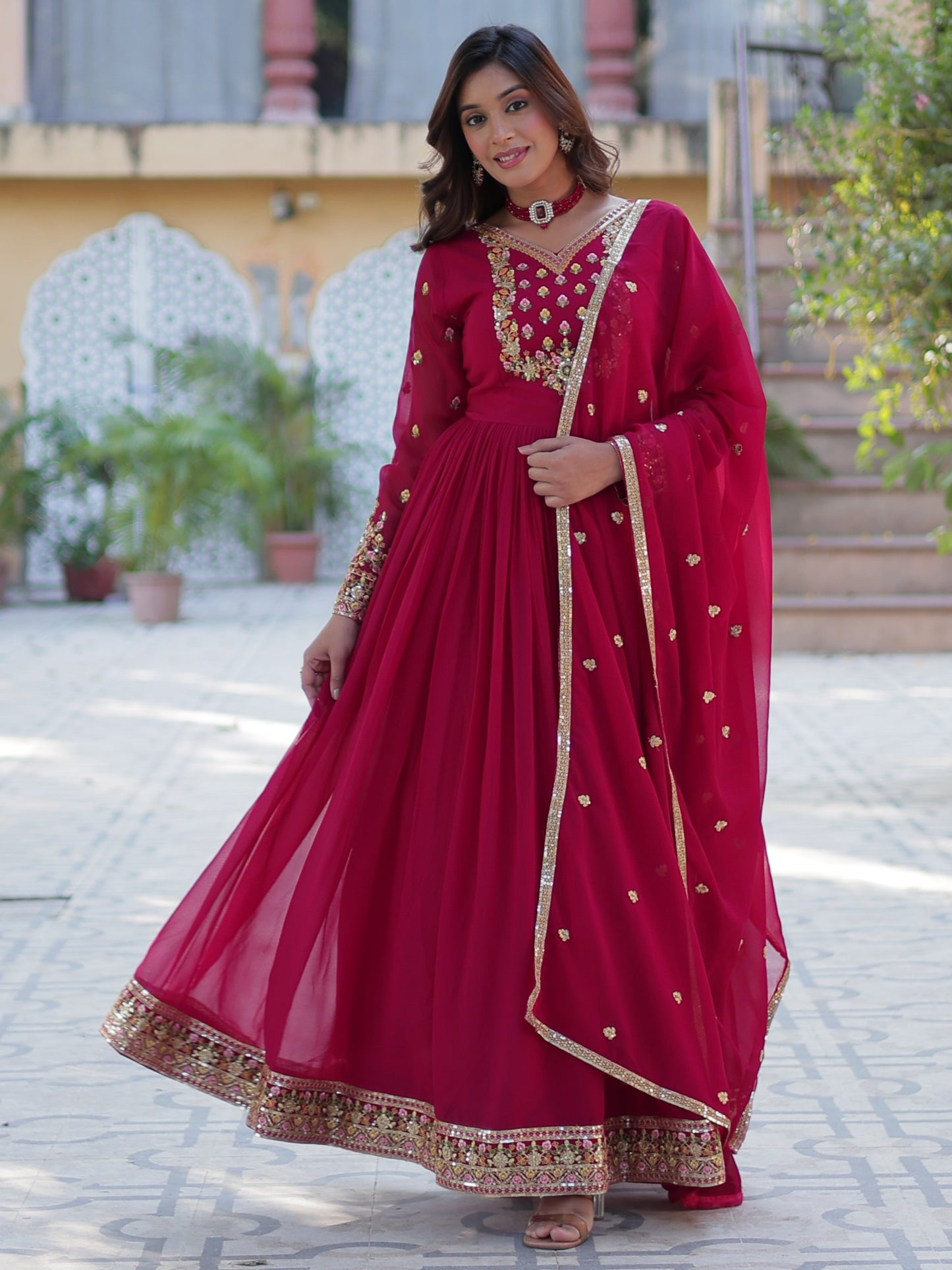 Ravishing Dark Pink Zari Work Georgette Engagement Wear Gown