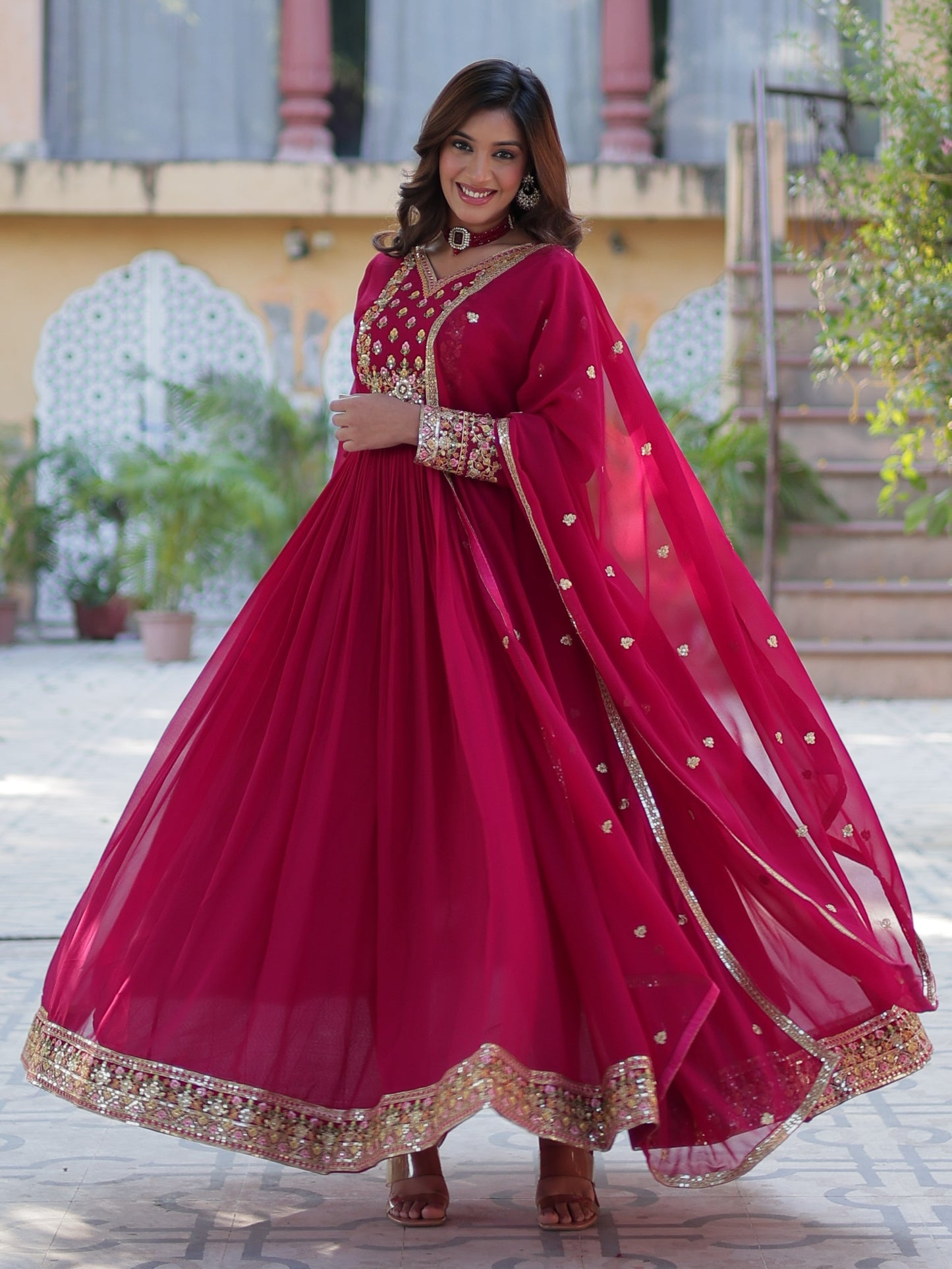 Ravishing Dark Pink Zari Work Georgette Engagement Wear Gown
