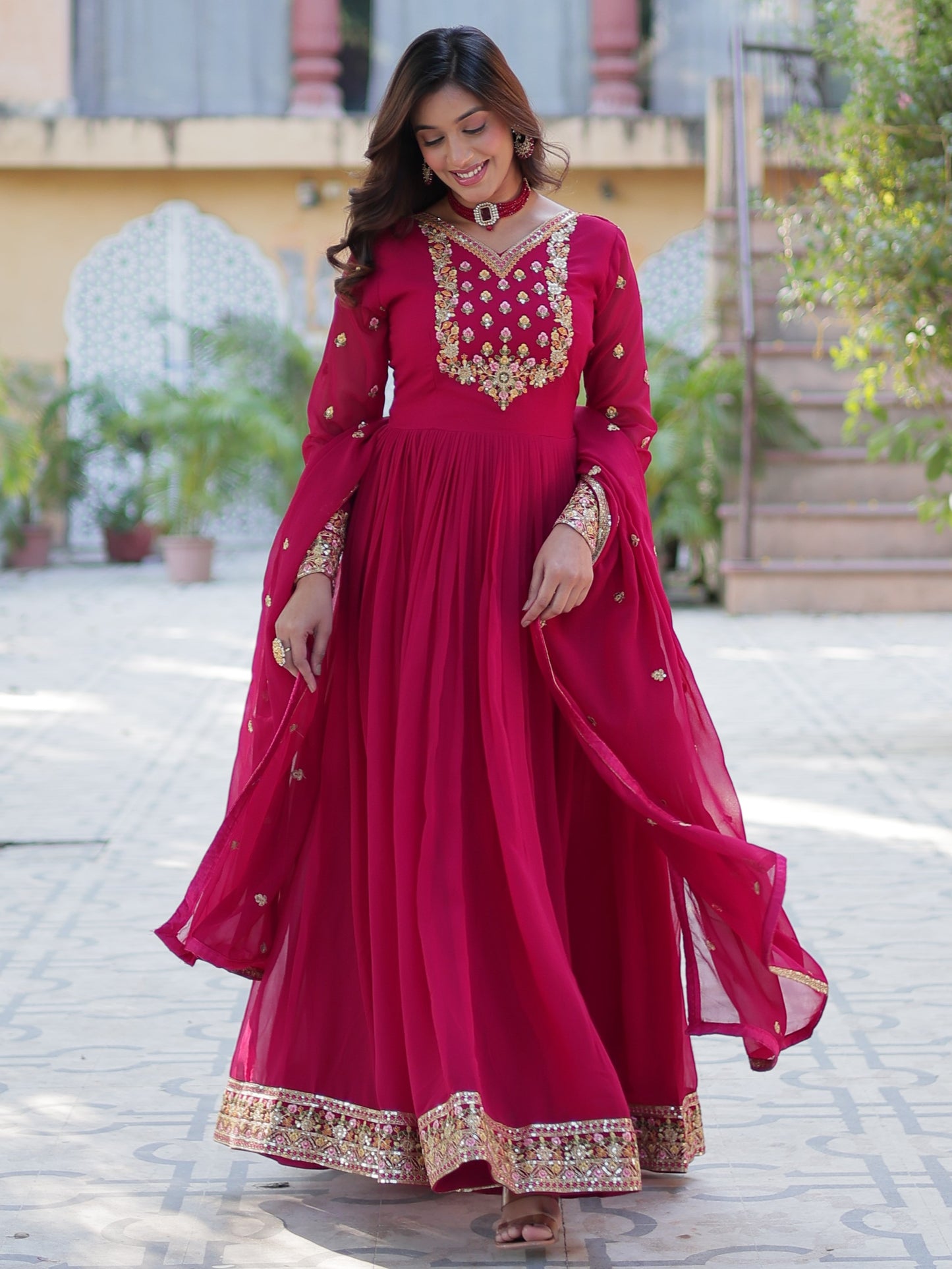 Ravishing Dark Pink Zari Work Georgette Engagement Wear Gown