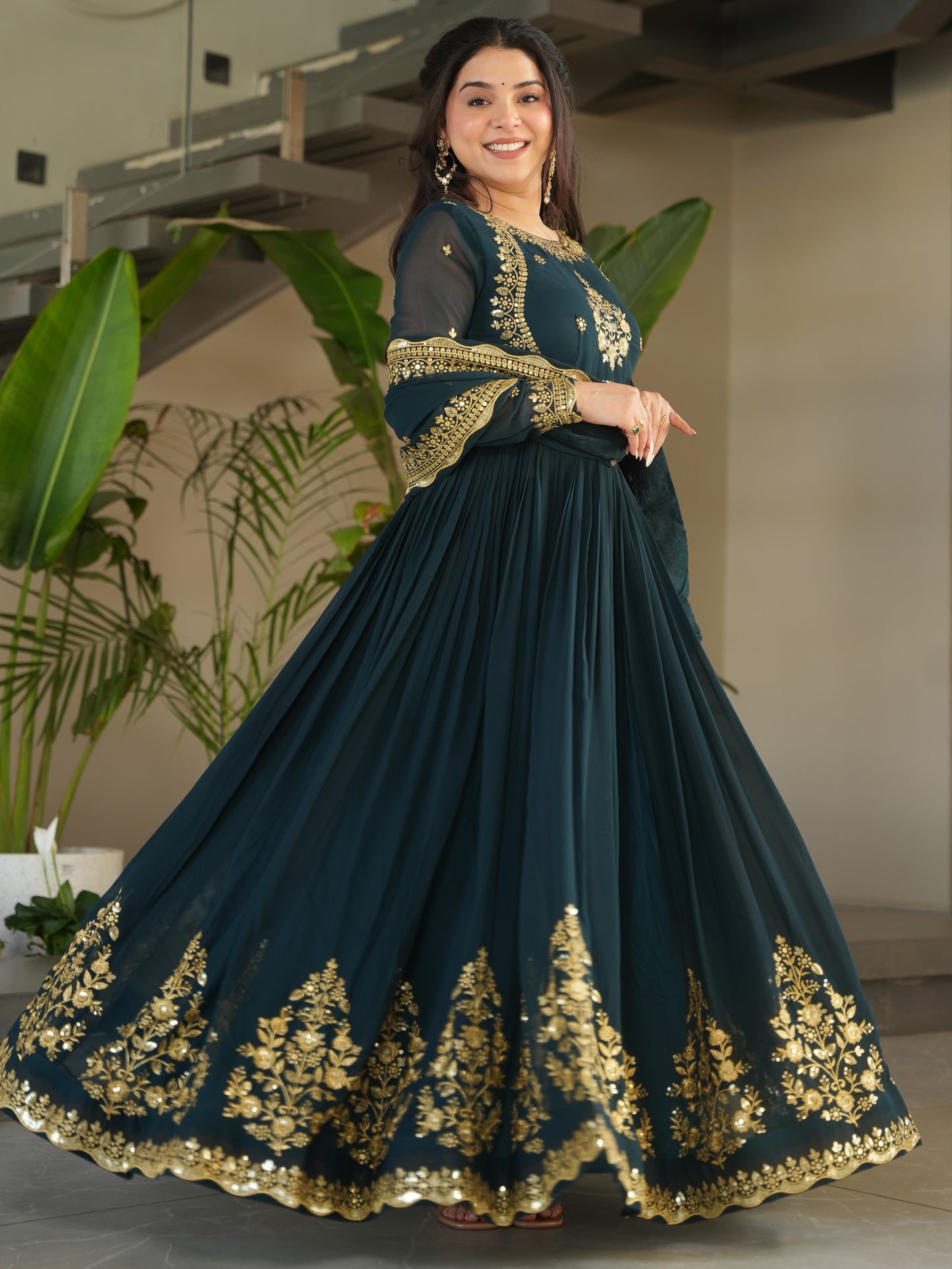 Impressive Green Embroidered Georgette Party Wear Gown