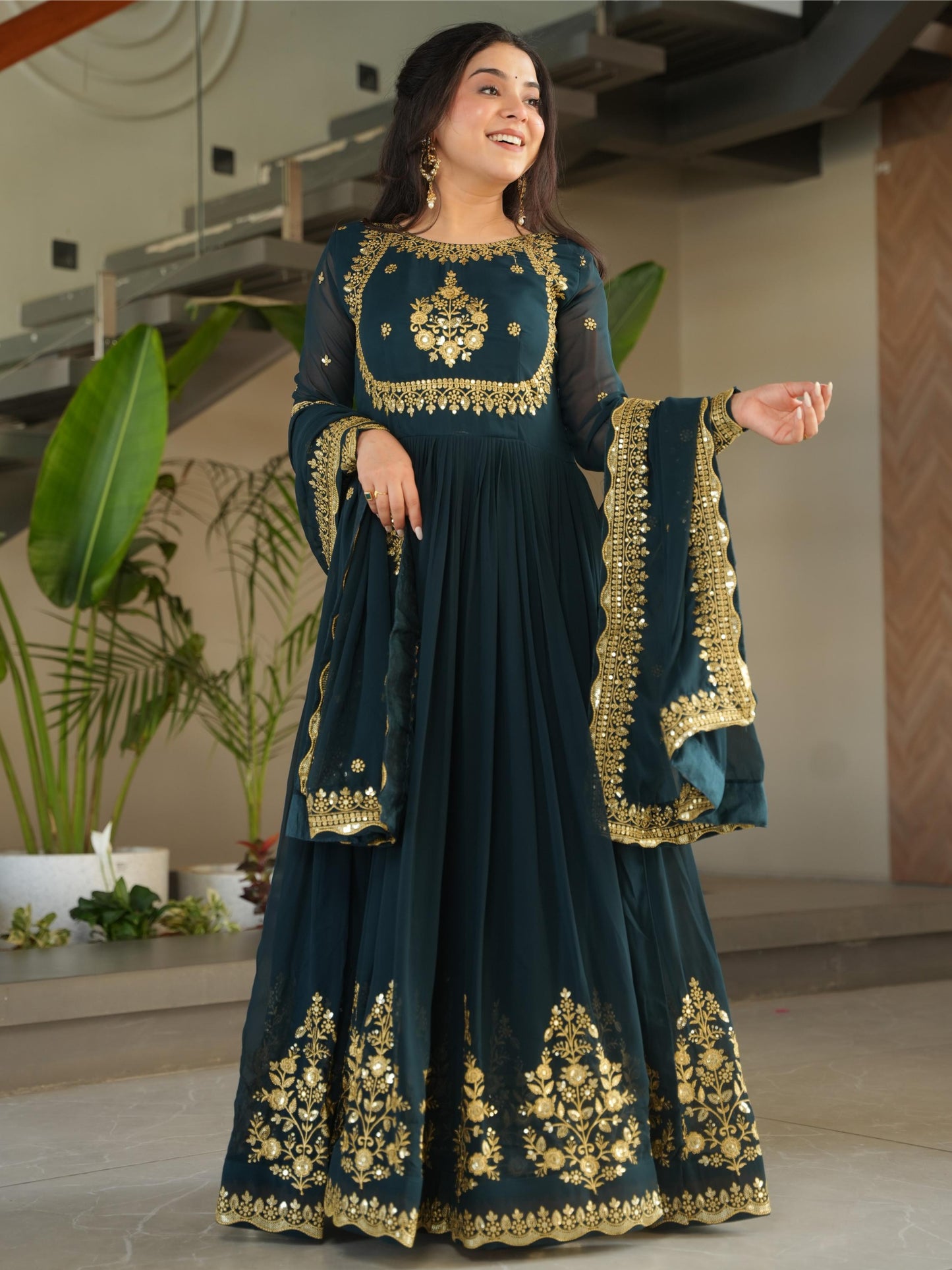 Impressive Green Embroidered Georgette Party Wear Gown