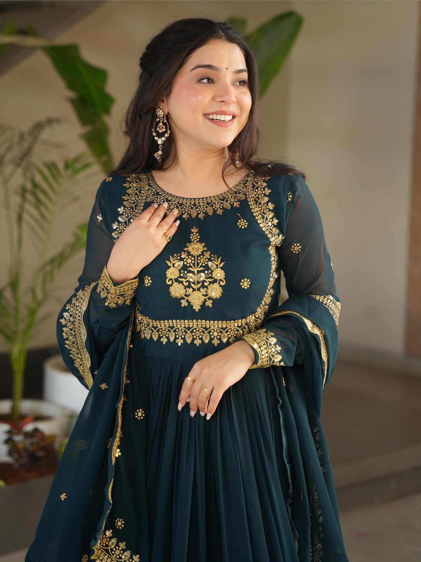 Impressive Green Embroidered Georgette Party Wear Gown