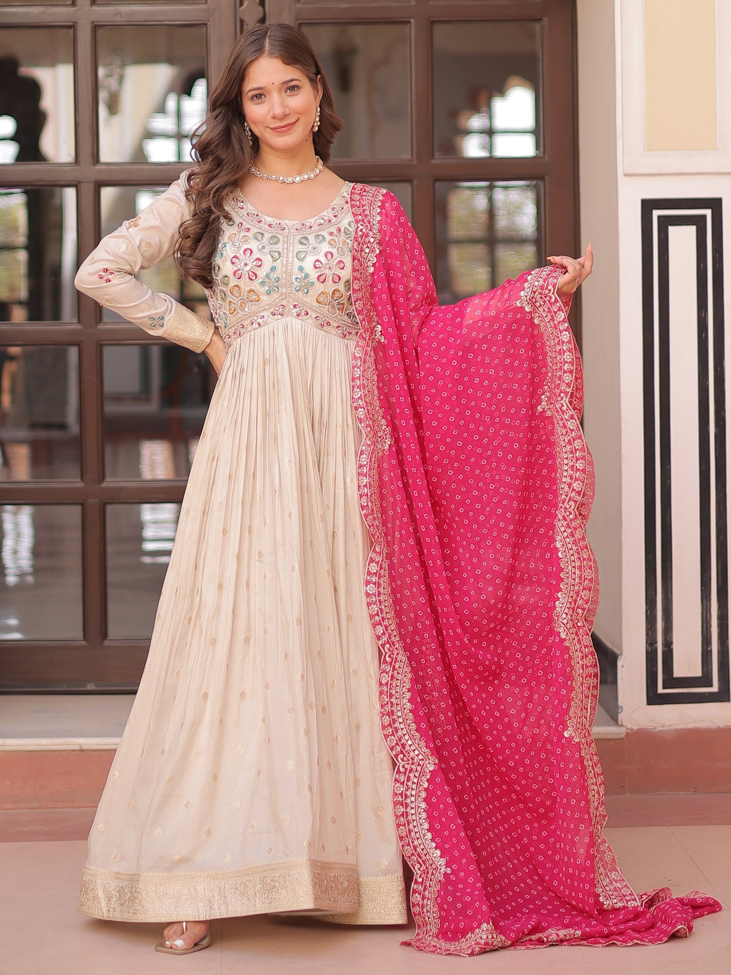 Marvelous Cream Silk Gown With Pink Bandhani Dupatta