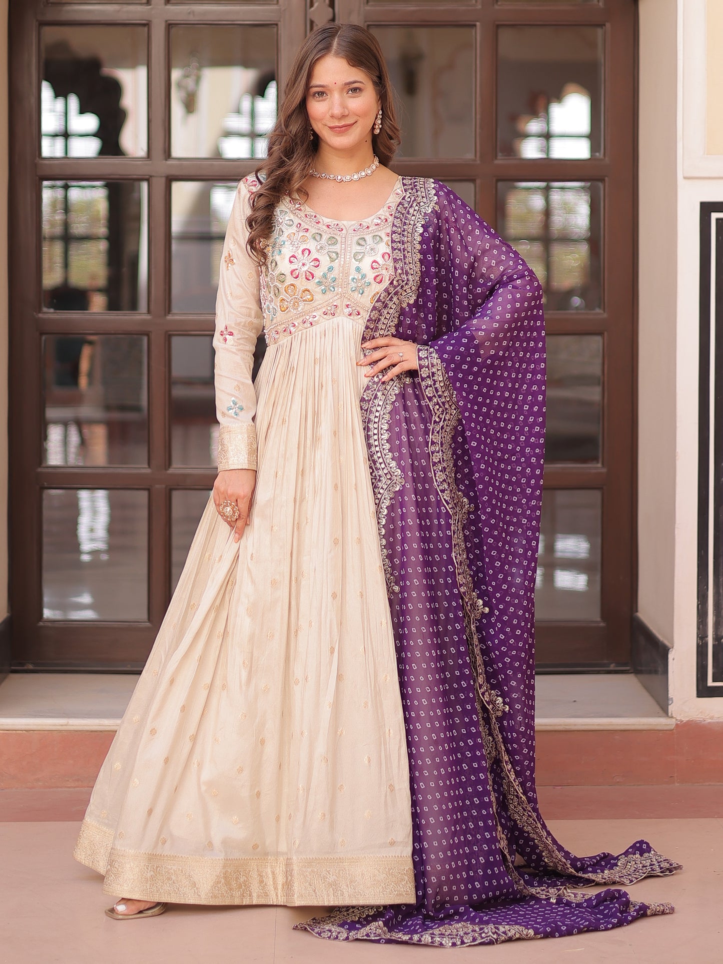 Attractive Cream Zari Work Silk Gown With Bandhani Dupatta