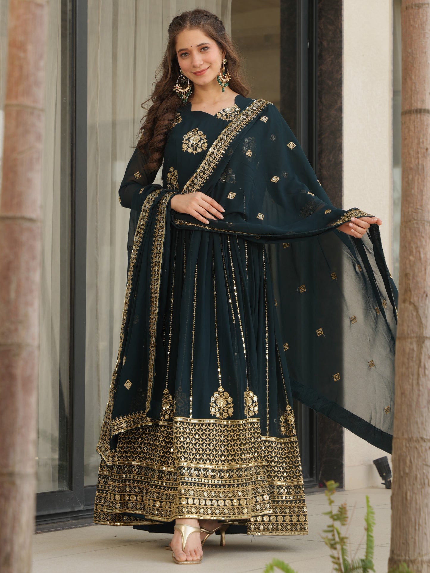 Winsome Dark Green Zari Work Georgette Engagement Wear Gown