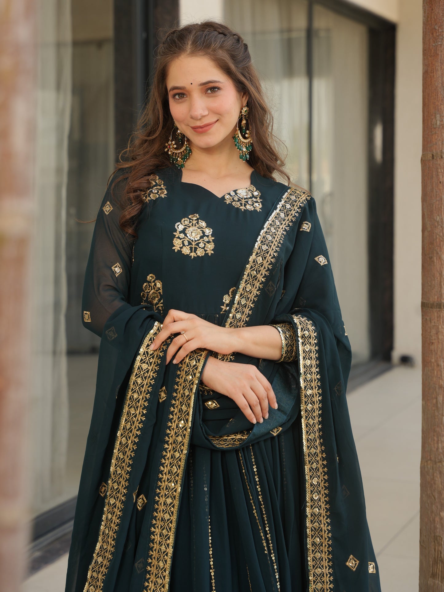 Winsome Dark Green Zari Work Georgette Engagement Wear Gown