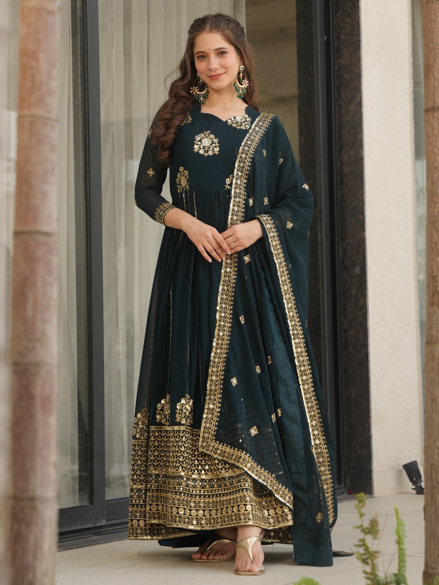 Winsome Dark Green Zari Work Georgette Engagement Wear Gown