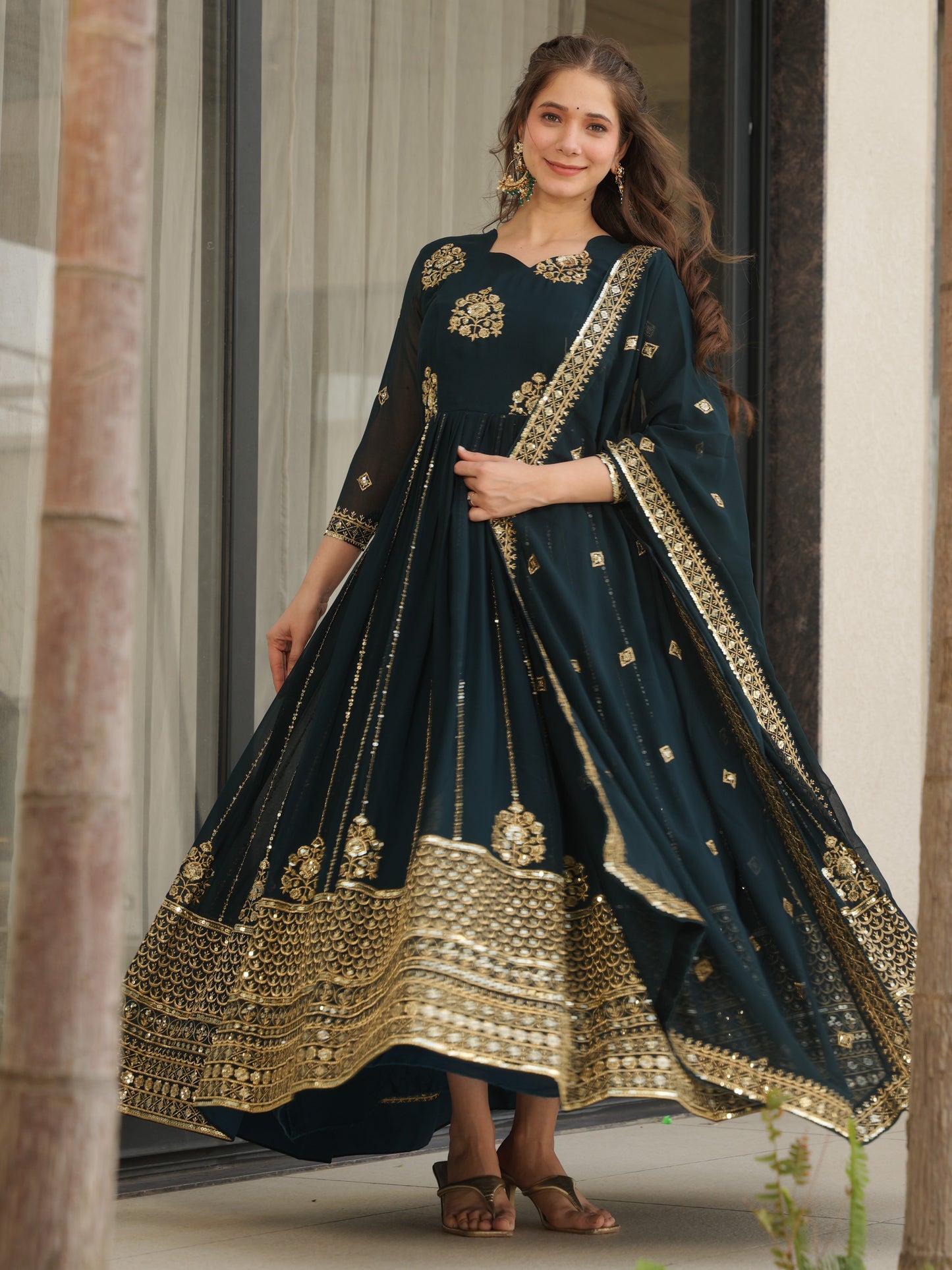 Winsome Dark Green Zari Work Georgette Engagement Wear Gown
