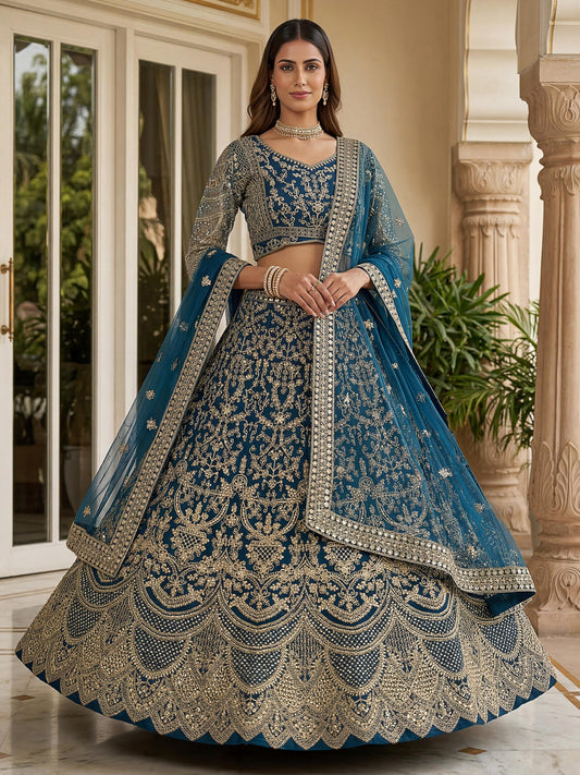 Spectacular Teal Blue Heavy Embroidered Net Reception Lehenga Choli