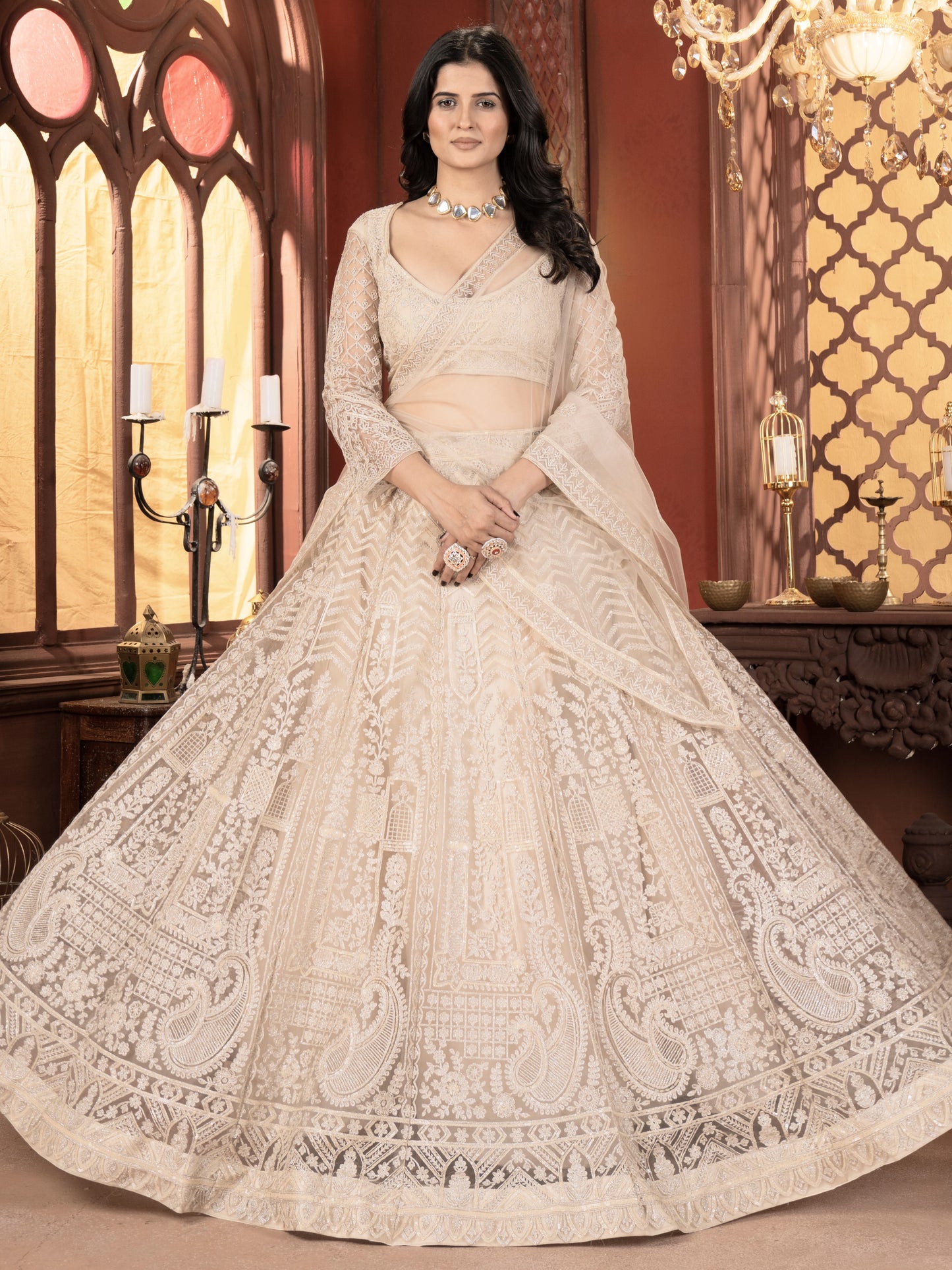 Bewitching Cream Embroidered Net Bridesmaid Lehenga Choli
