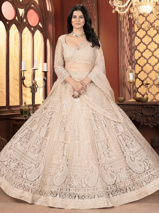 Bewitching Cream Embroidered Net Bridesmaid Lehenga Choli