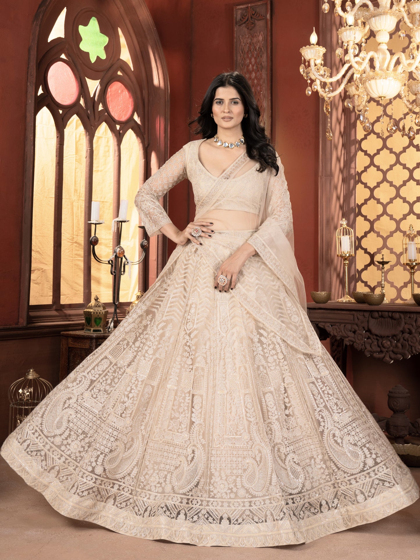 Bewitching Cream Embroidered Net Bridesmaid Lehenga Choli