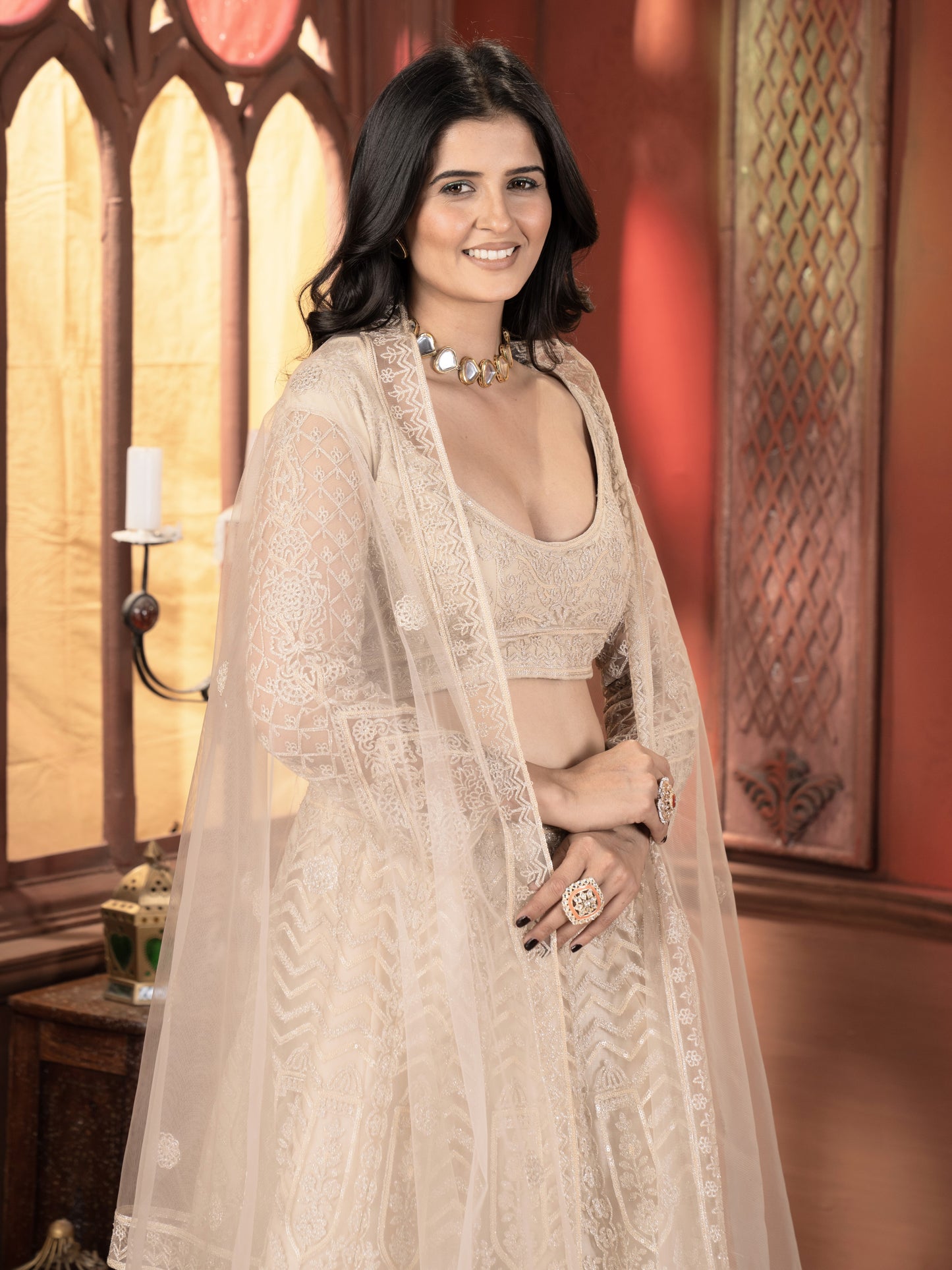 Bewitching Cream Embroidered Net Bridesmaid Lehenga Choli