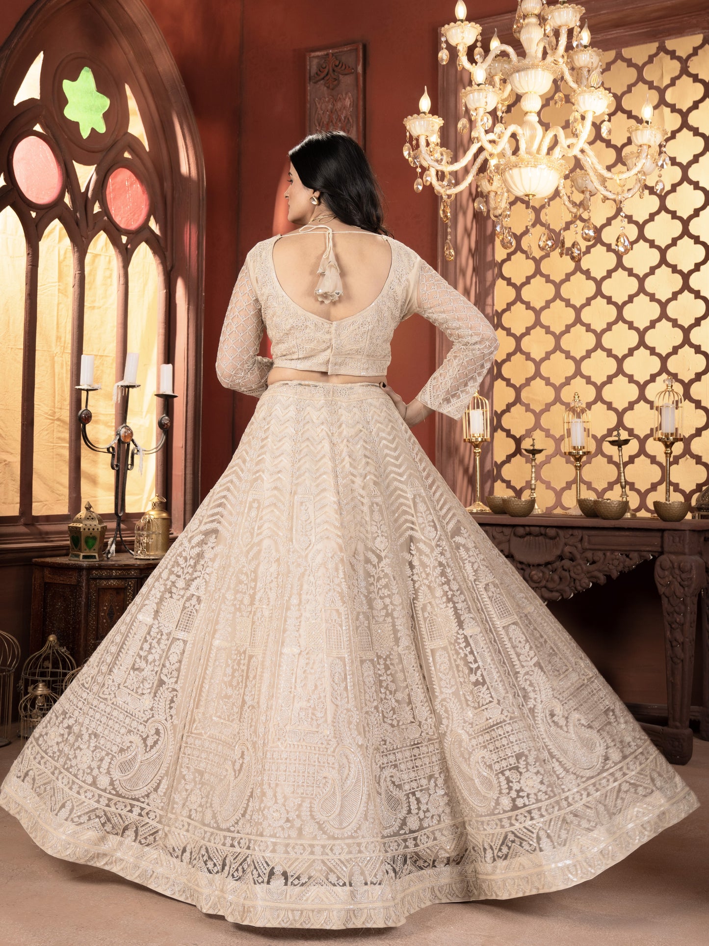 Bewitching Cream Embroidered Net Bridesmaid Lehenga Choli
